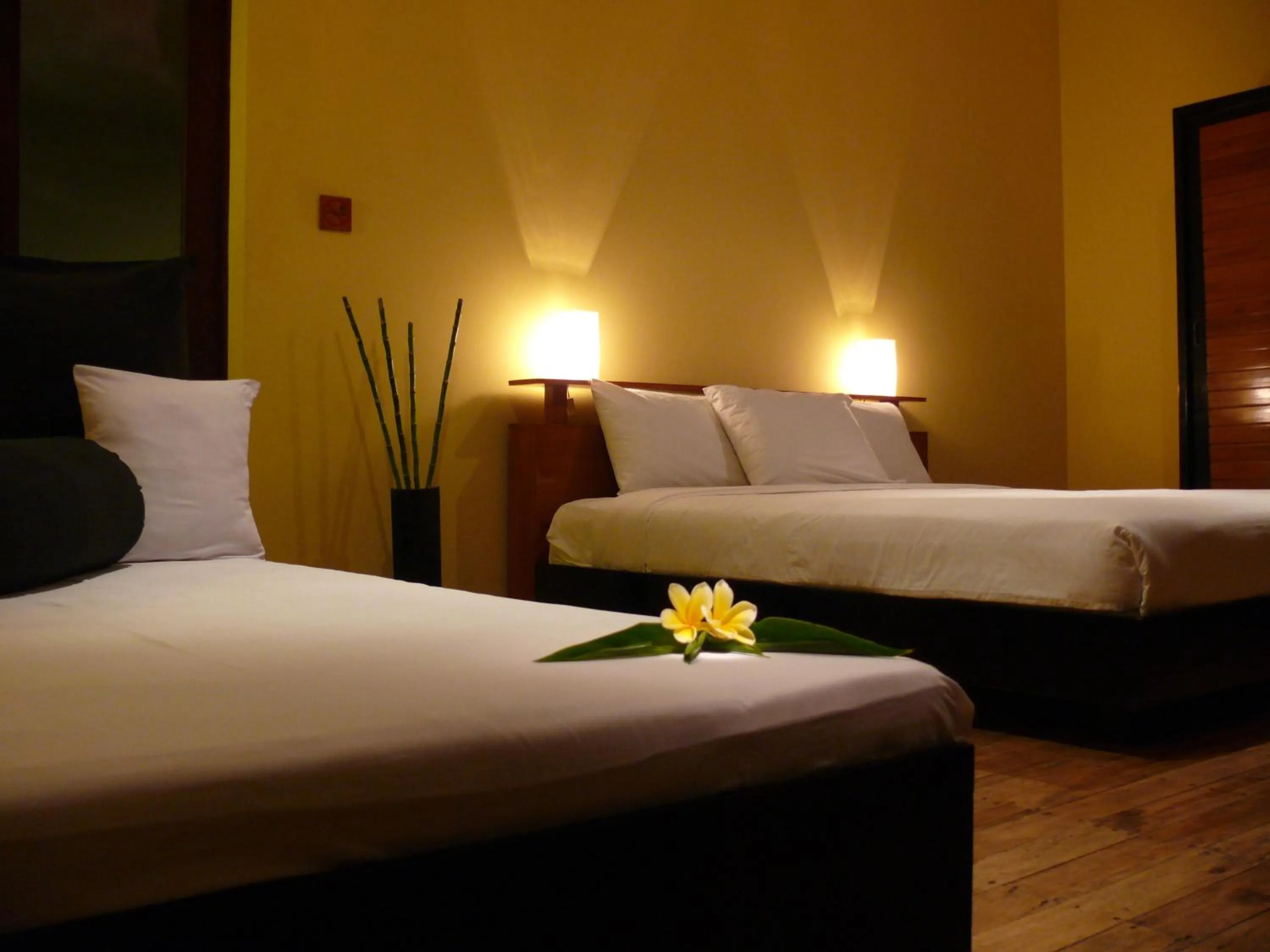 Bedroom, Bed in JavaCove Beach Hotel