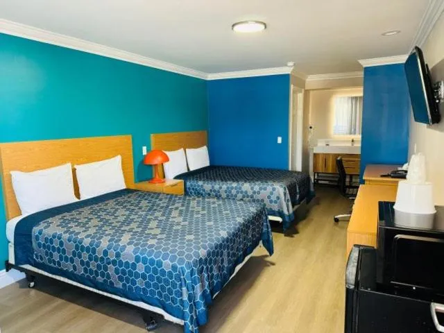 Bed in Signature Inn San Jose