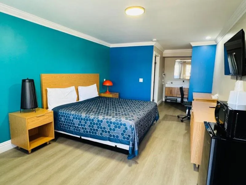 Bed in Signature Inn San Jose