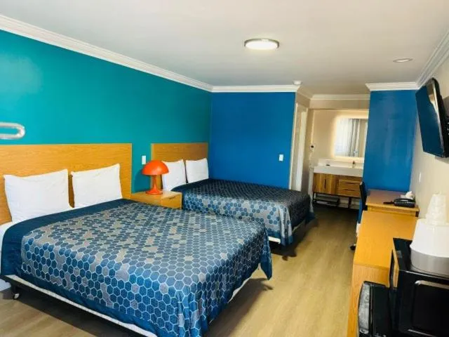 Bed in Signature Inn San Jose