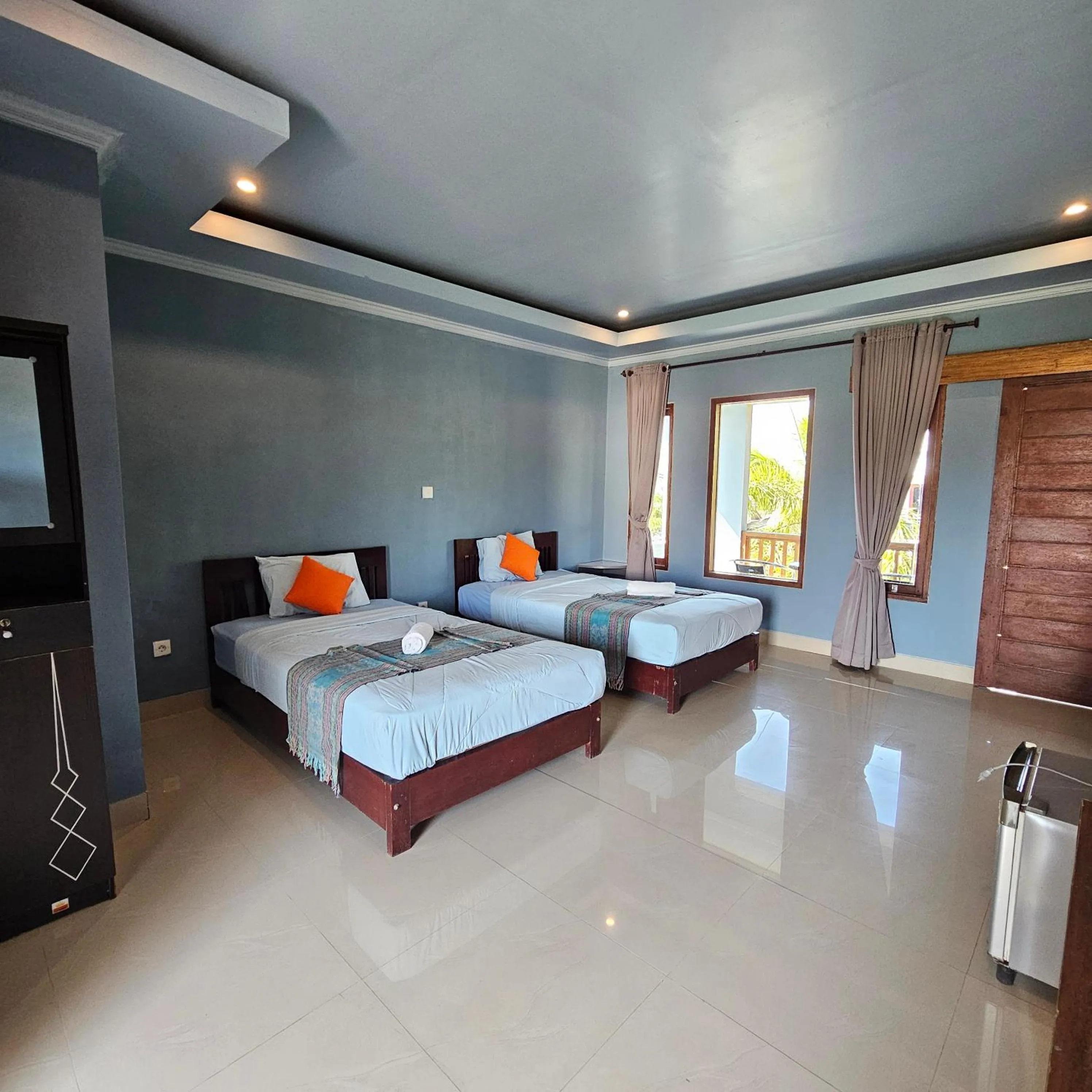 Bed in Ridho Malik Hotel