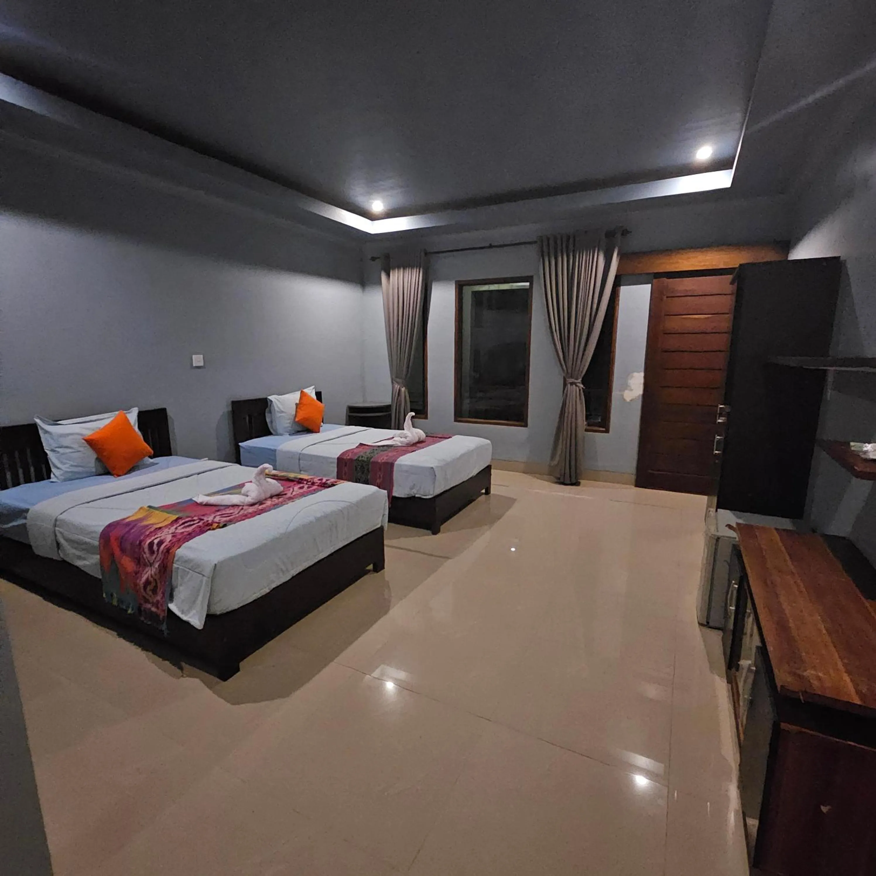 Photo of the whole room, Bed in Ridho Malik Hotel