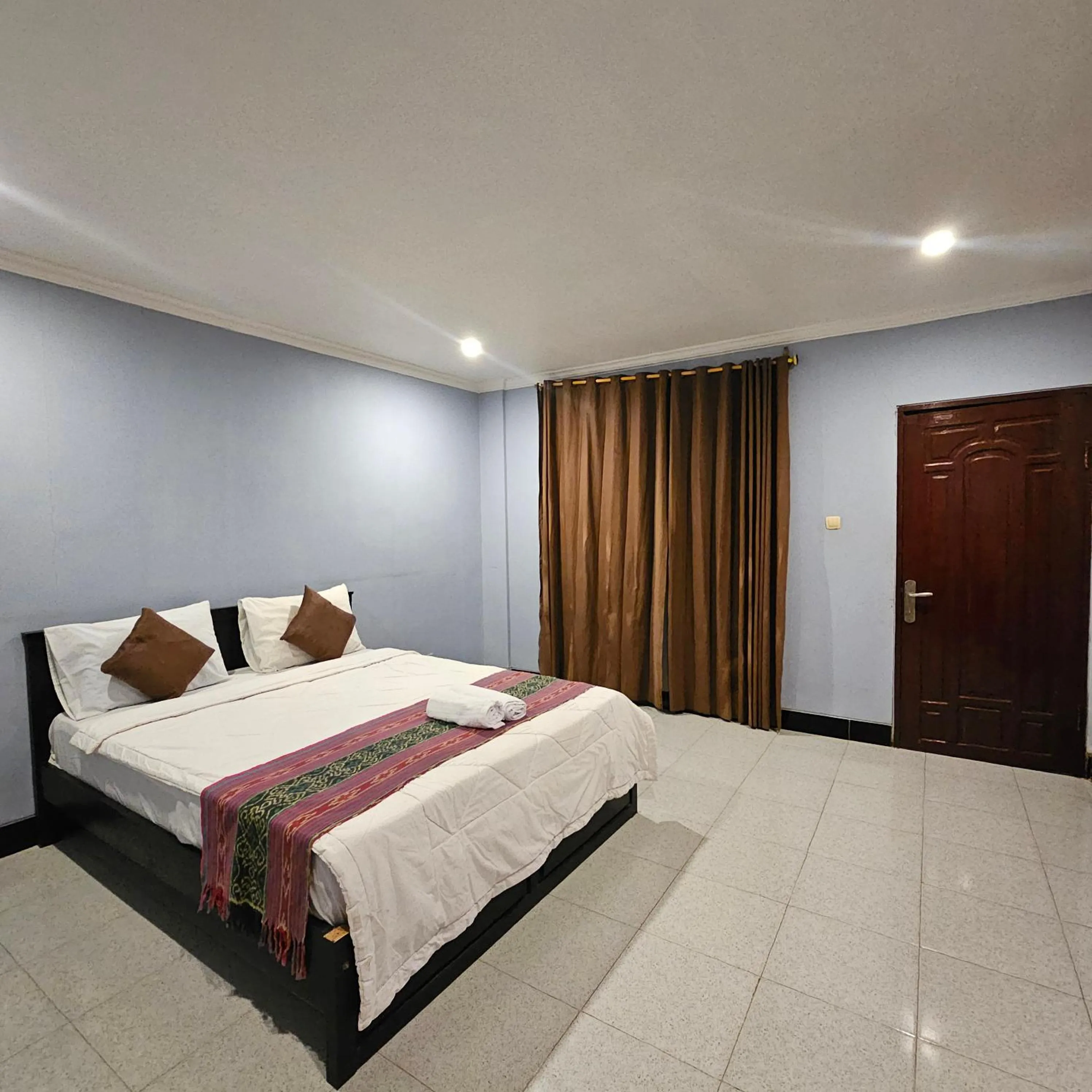 Bed in Ridho Malik Hotel