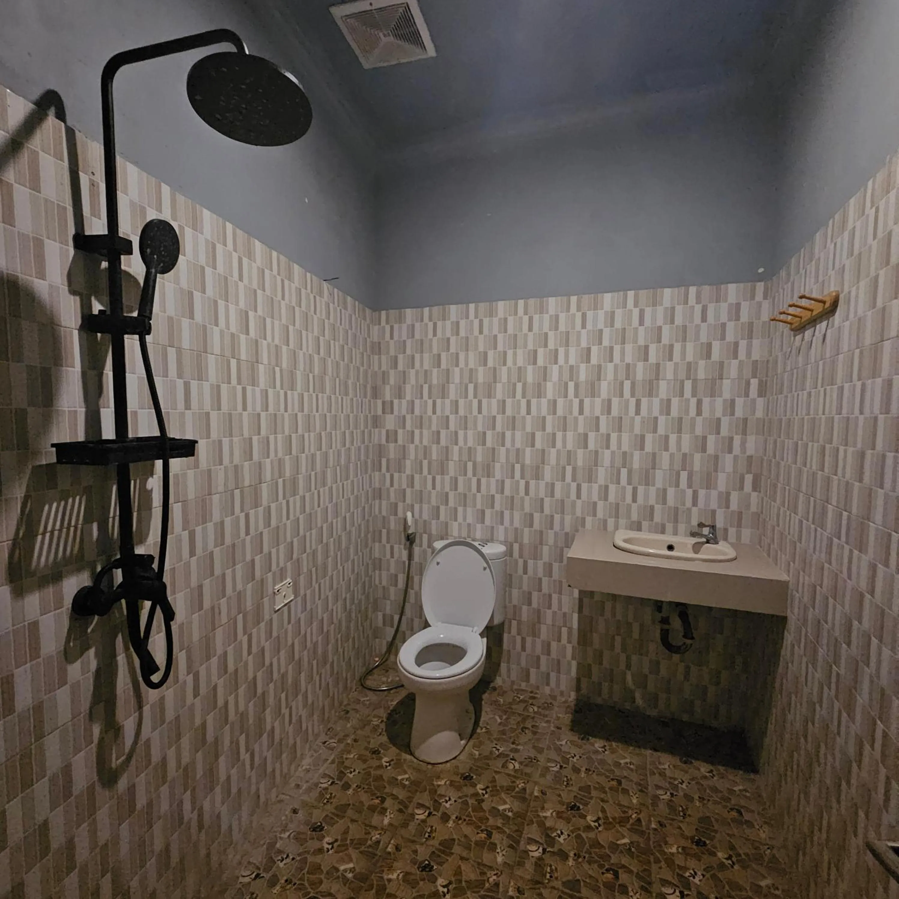 Toilet in Ridho Malik Hotel