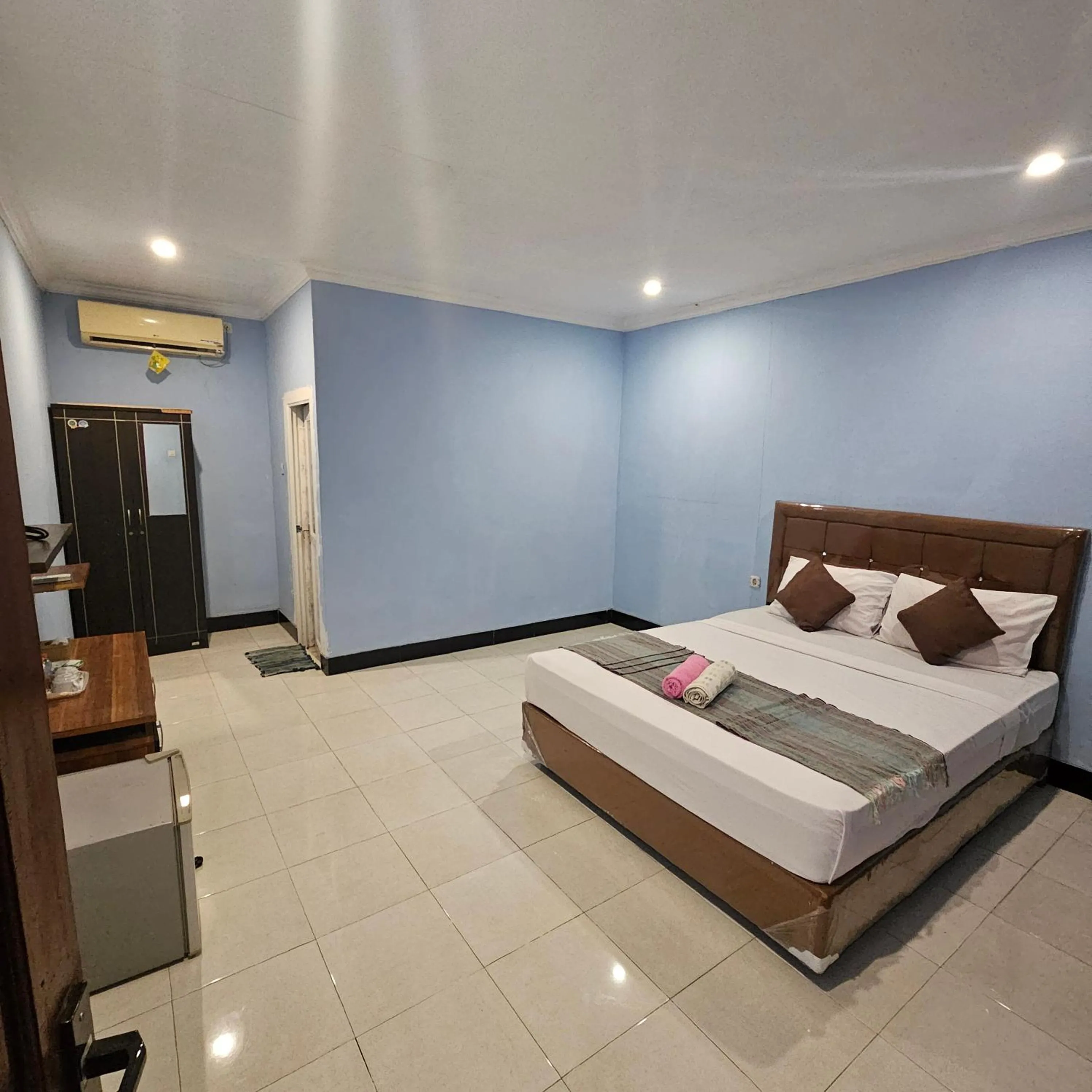 Bed in Ridho Malik Hotel