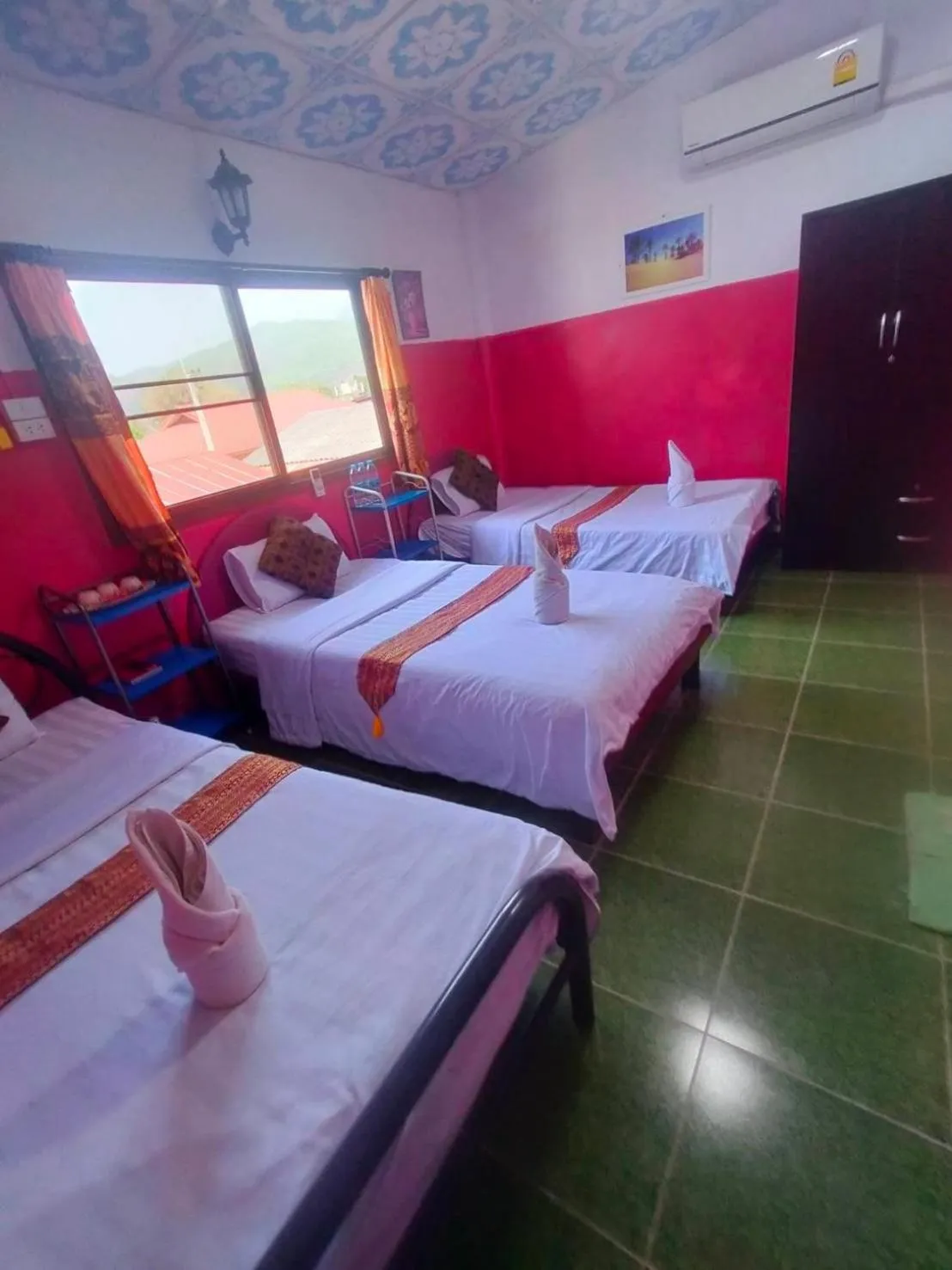 Bed in Sabaydee House at Pai