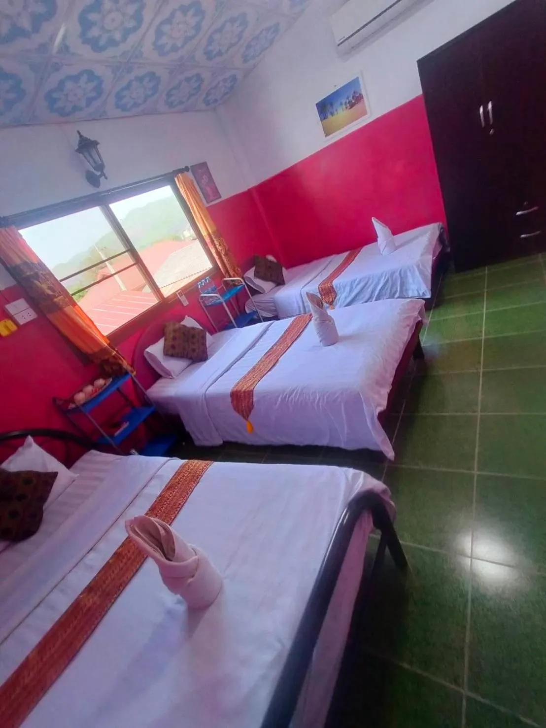 Bed in Sabaydee House at Pai