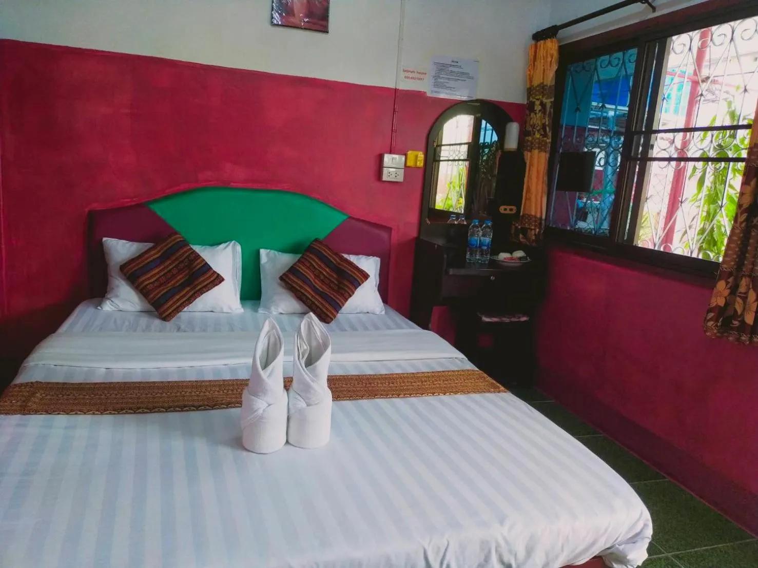 Bed in Sabaydee House at Pai