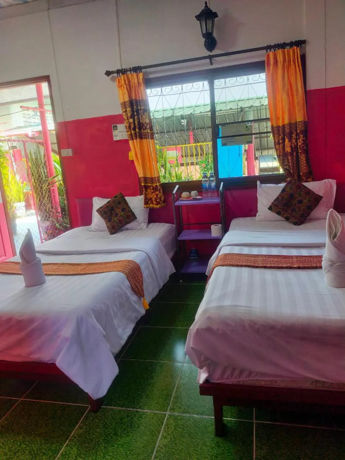 Bed in Sabaydee House at Pai