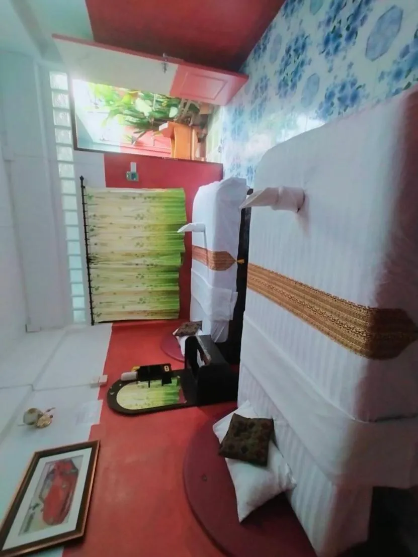 Bed in Sabaydee House at Pai