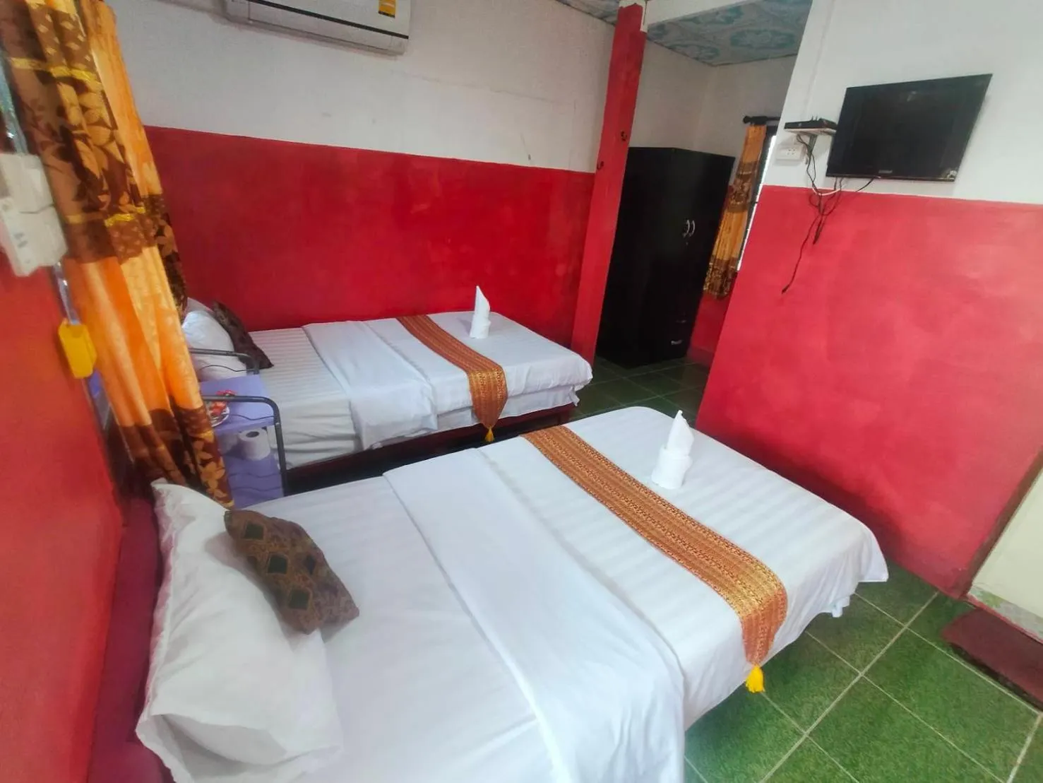 Bed in Sabaydee House at Pai