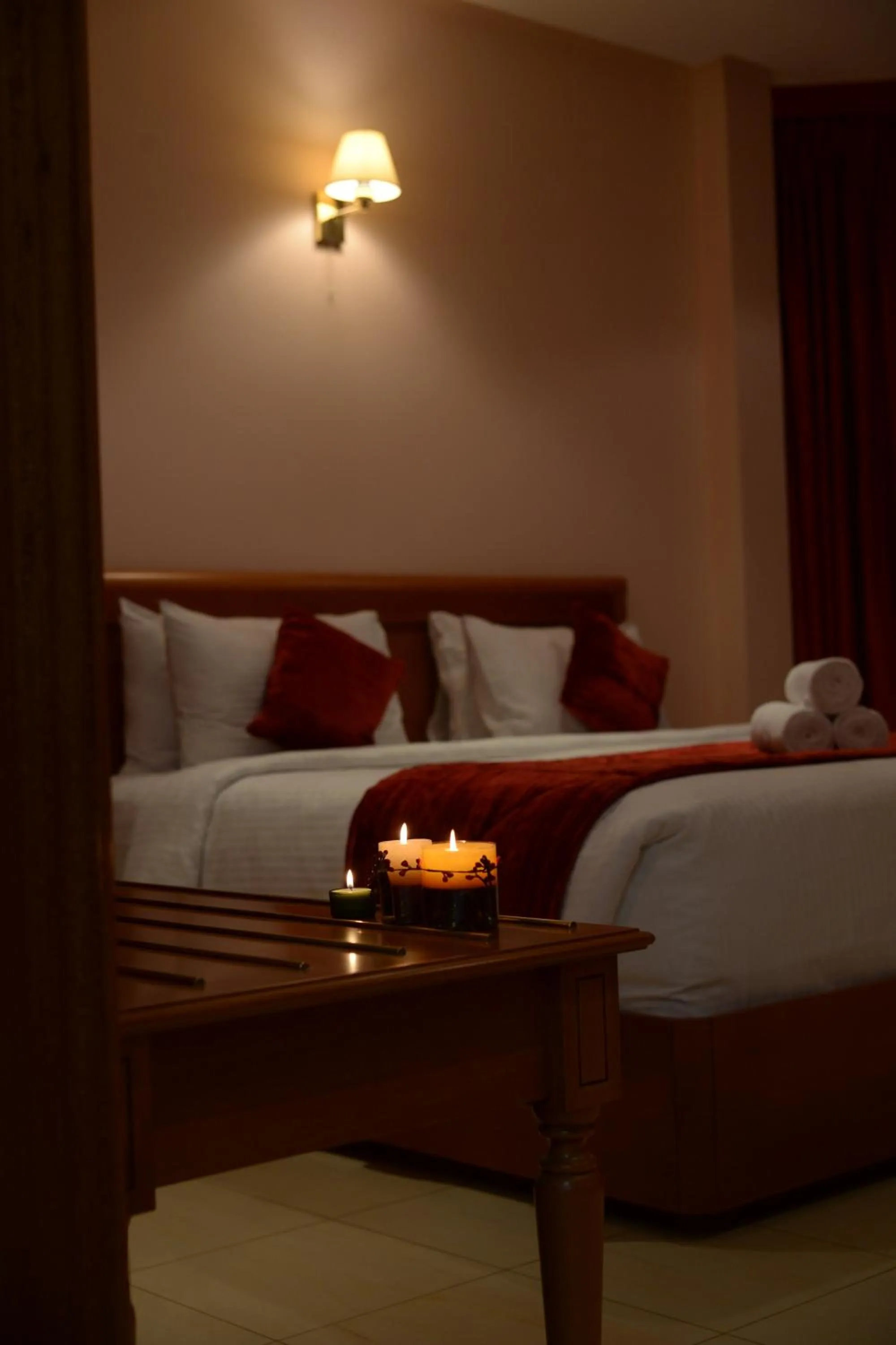 Bedroom, Bed in Al Madina Suites Doha