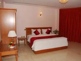 Bed in Al Madina Suites Doha