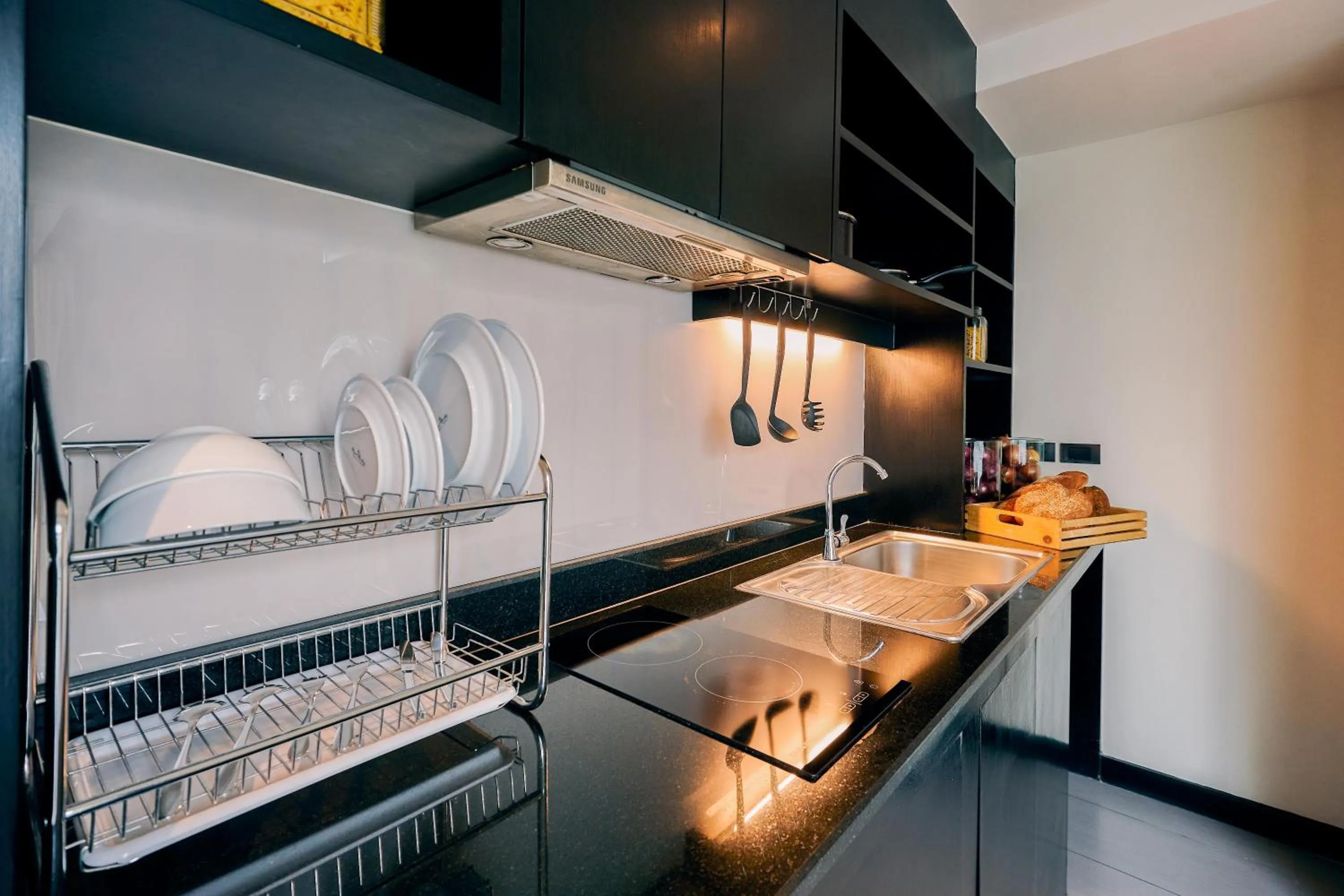 Kitchen or kitchenette in Golden Tulip Mandison Suites
