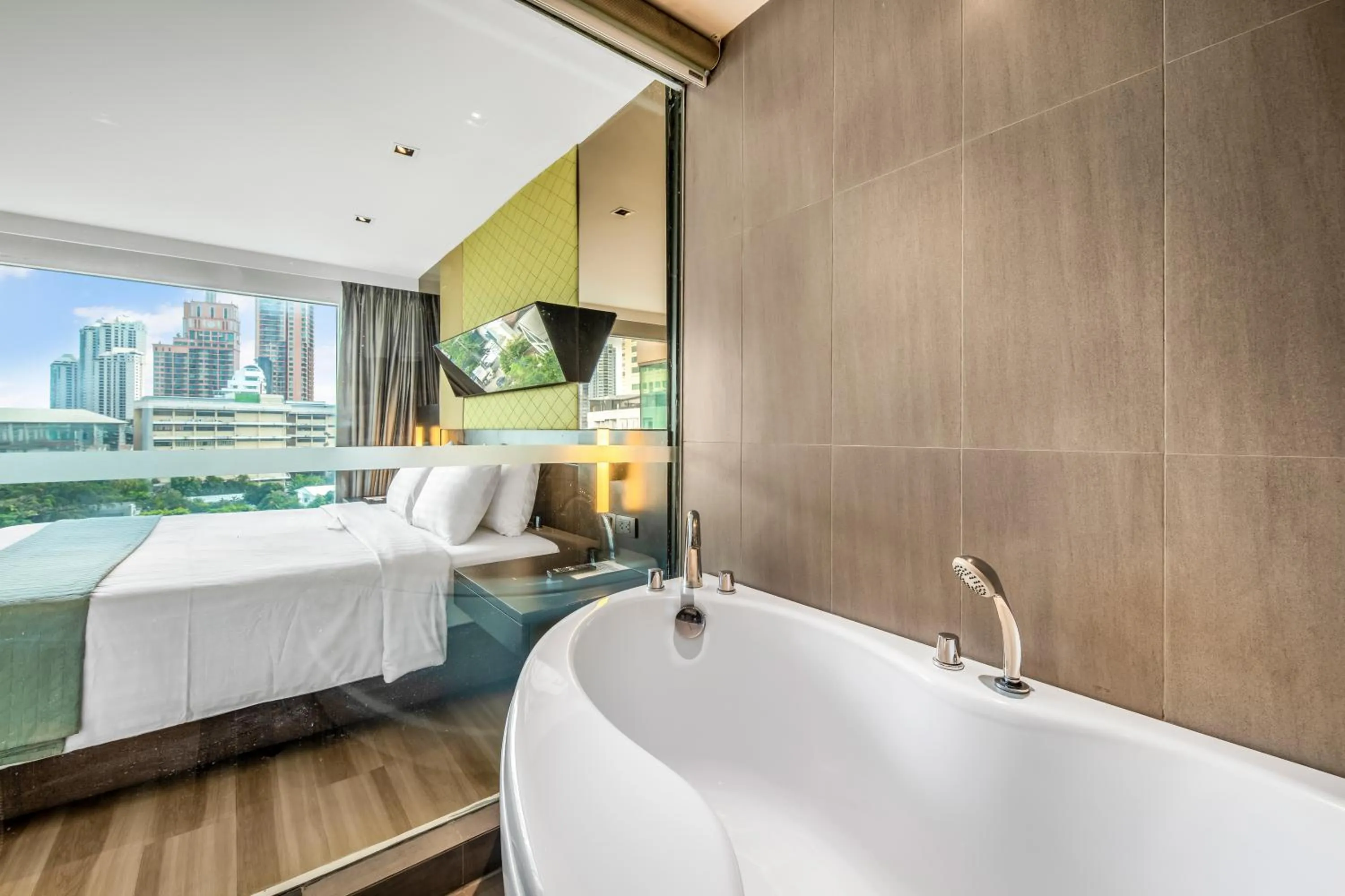 Bathroom, Bed in Golden Tulip Mandison Suites