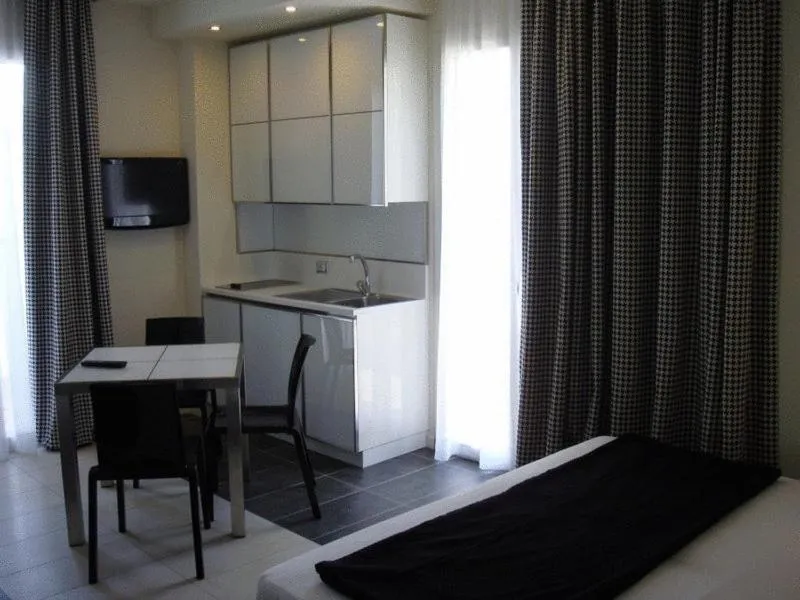 Dining area in Atmosphere Suite Hotel