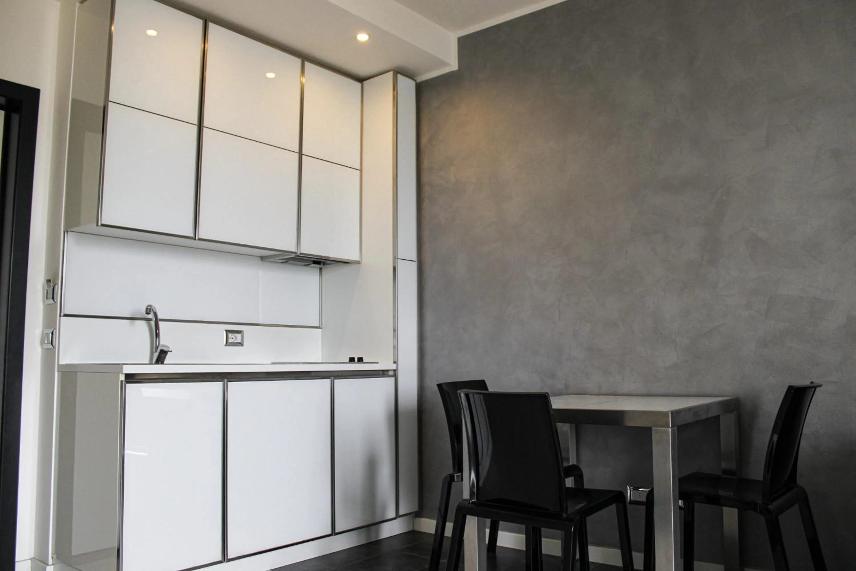 Kitchen or kitchenette in Atmosphere Suite Hotel