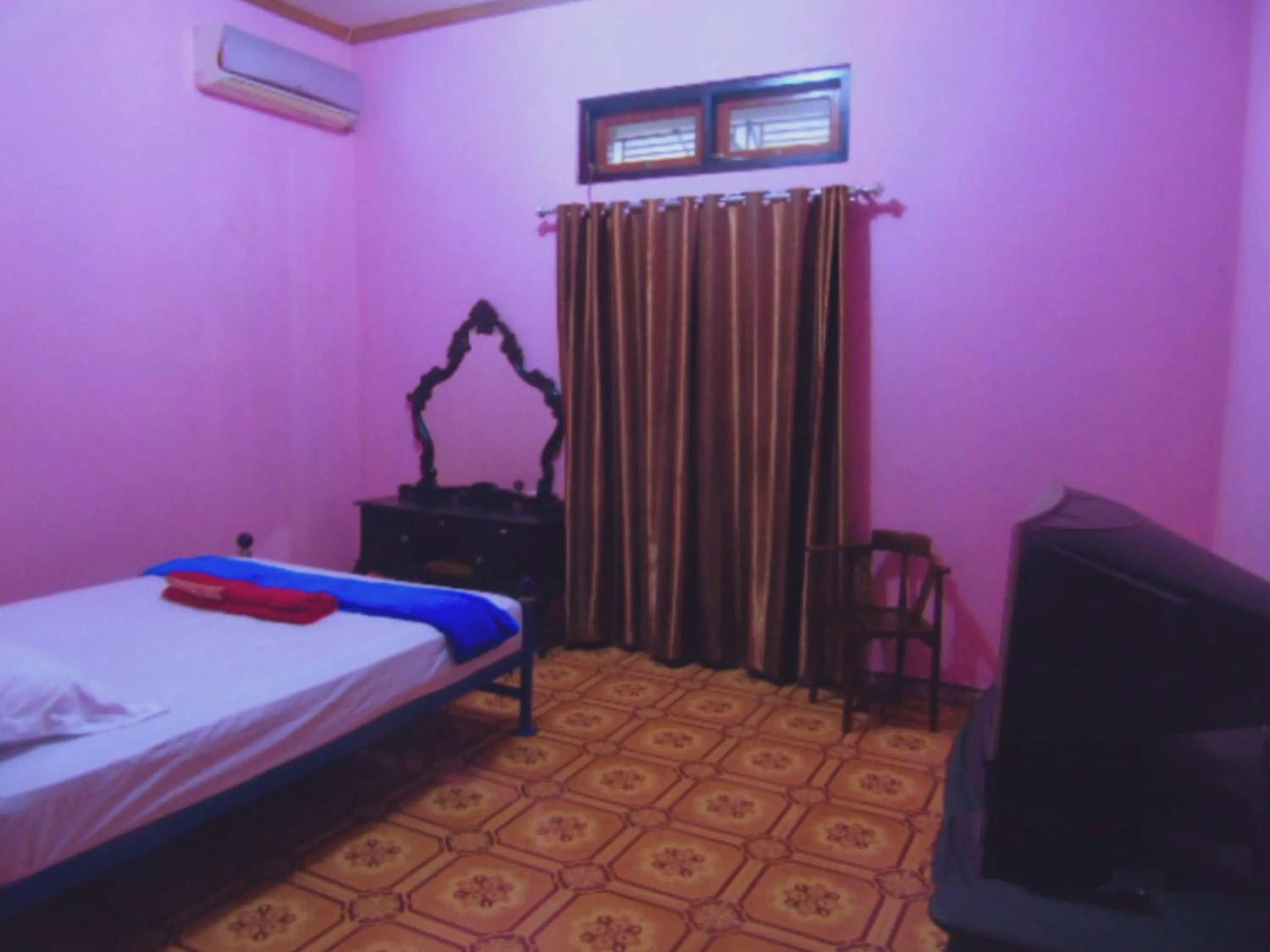 Bed in Aini Home Stay