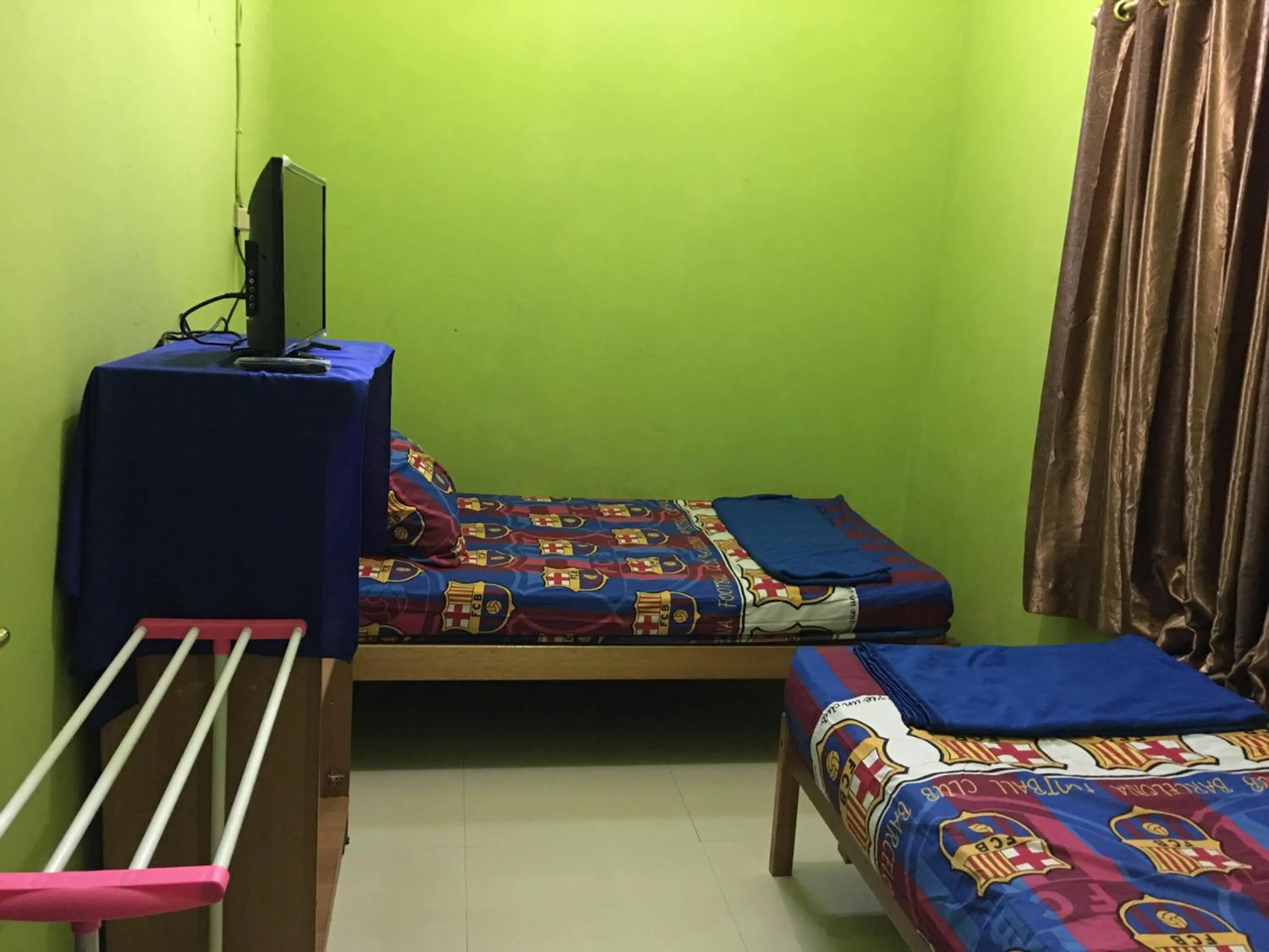 Bed in Aini Home Stay