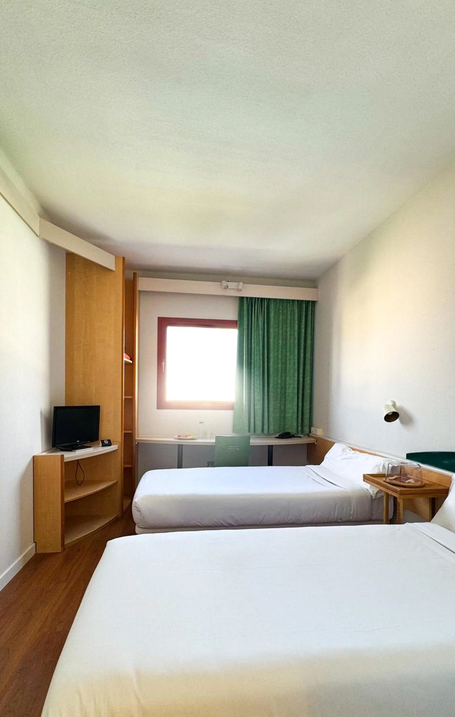 Bed in Hotel Iris Guadalajara