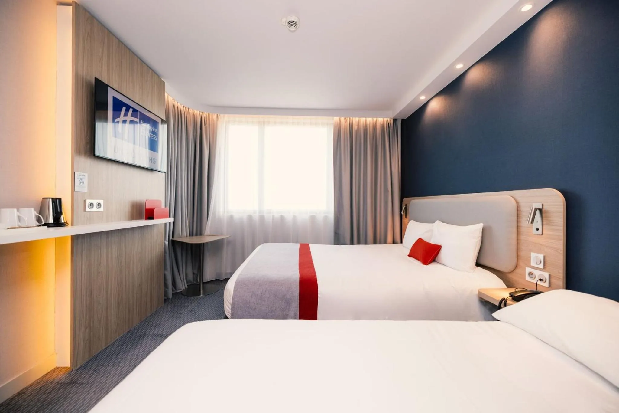 Photo of the whole room, Bed in Holiday Inn Express - Paris - CDG Airport by IHG