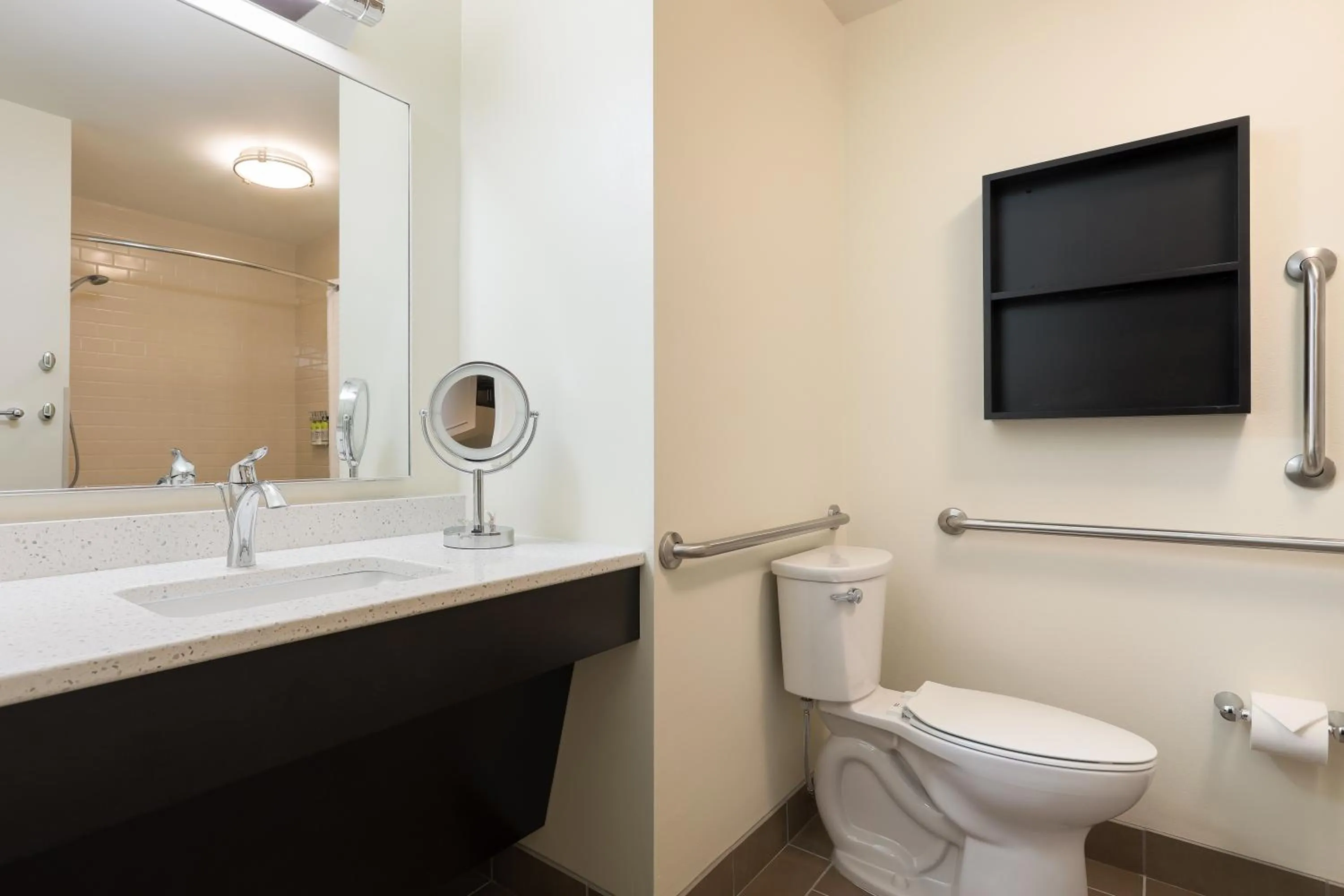Bathroom in Candlewood Suites Lenexa - Overland Park Area by IHG