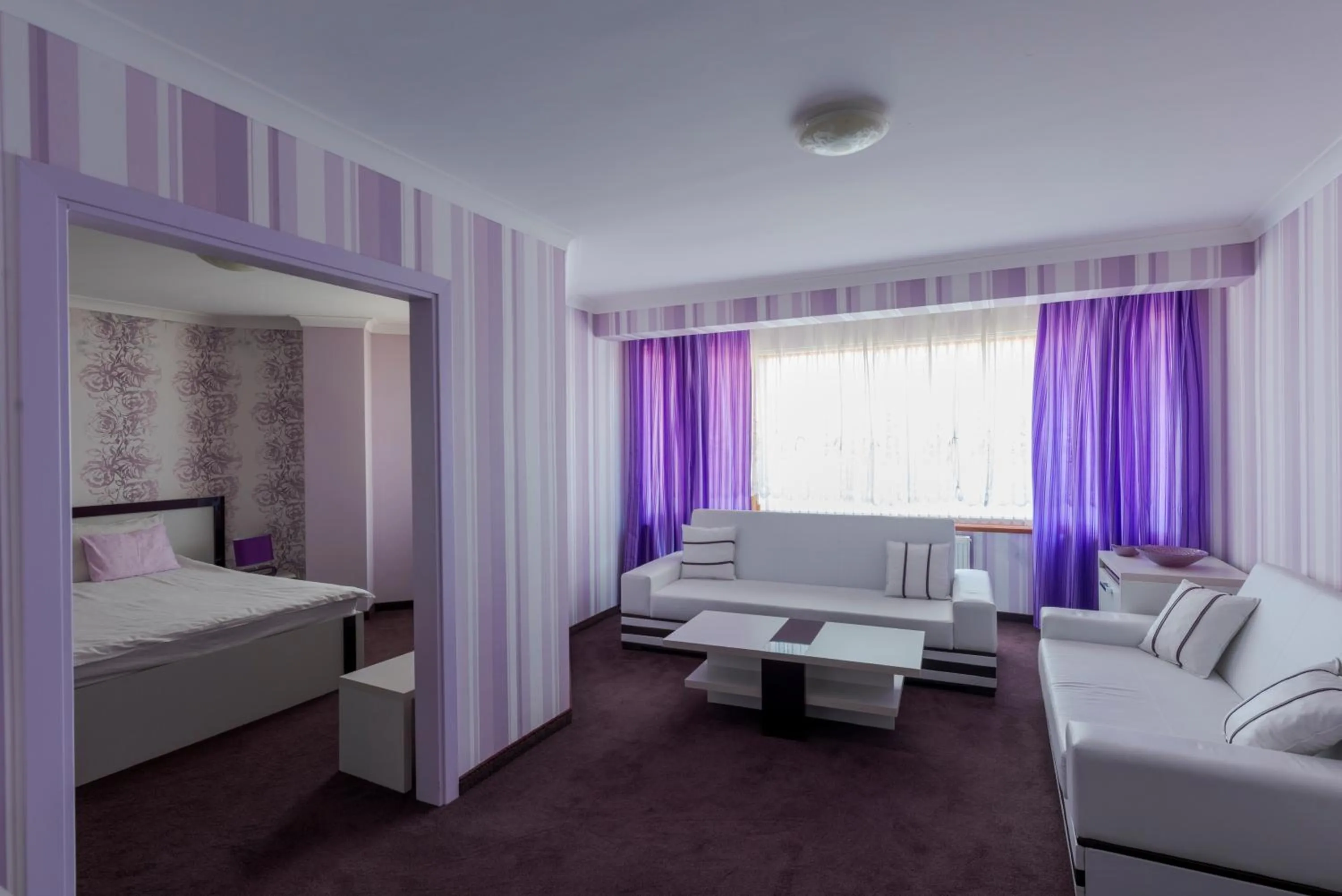 Bed in Семеен хотел Кристал