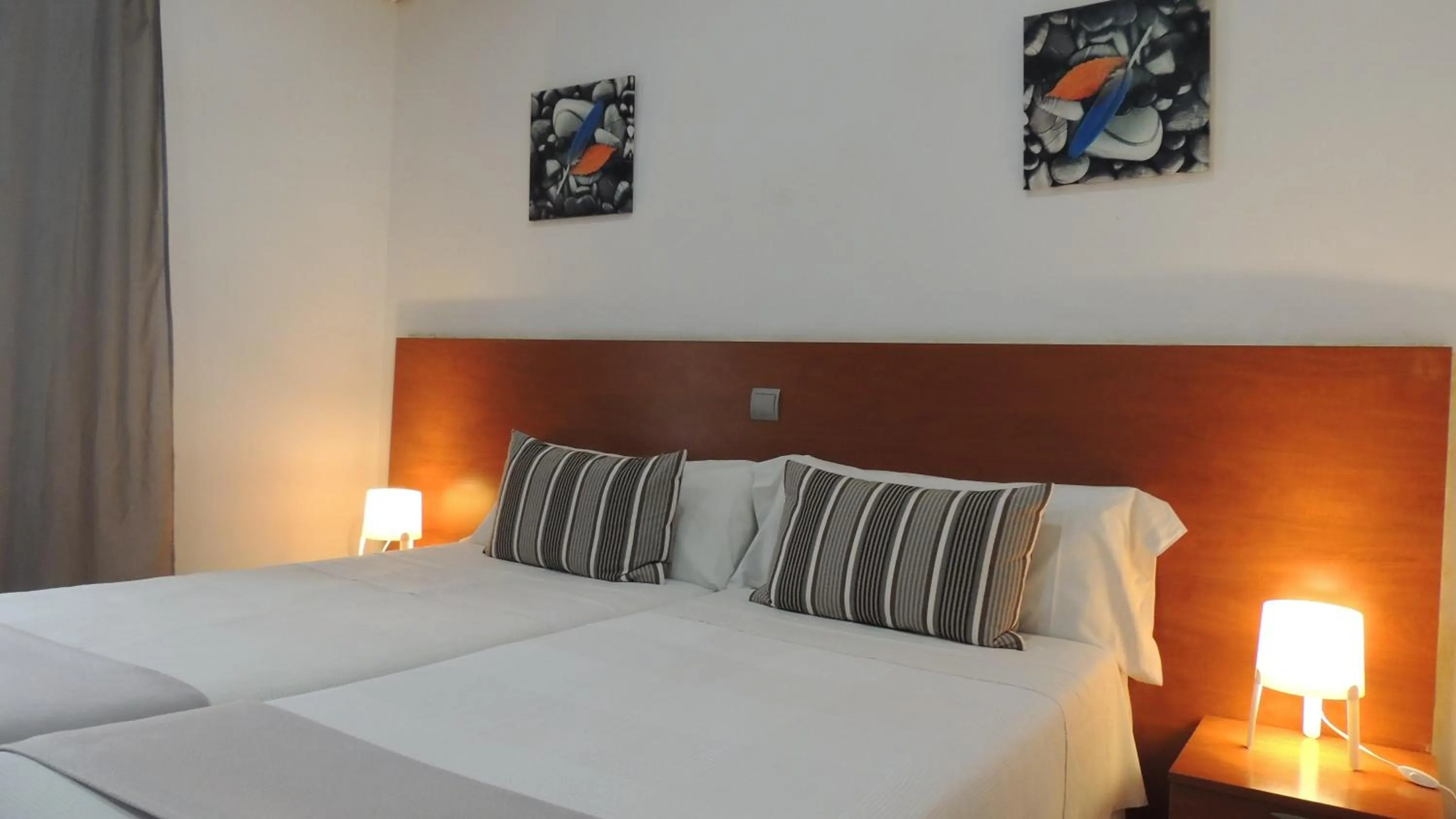 Photo of the whole room, Bed in Hostal Cervantes