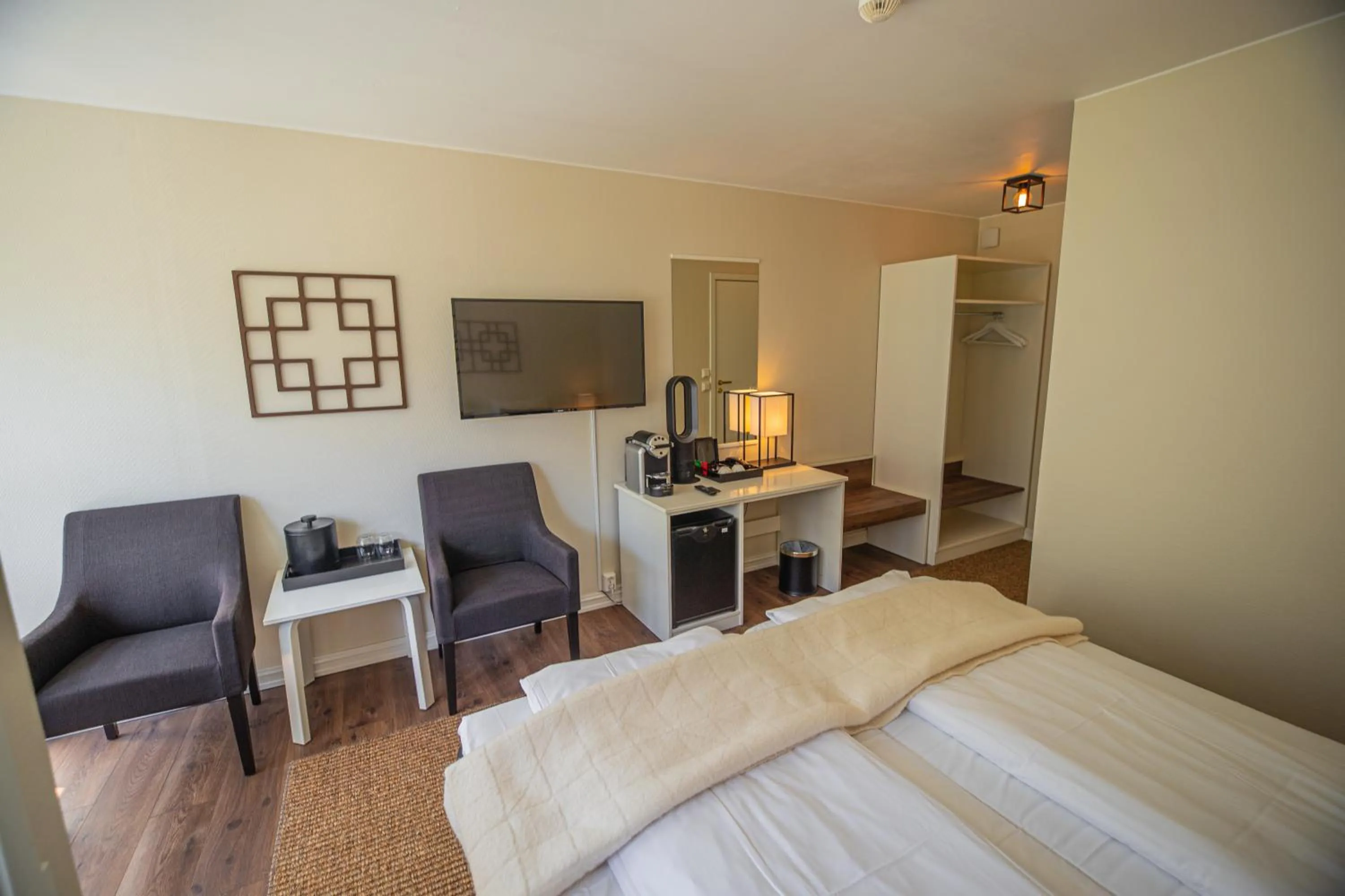 Bed in Grande Fjord Hotel