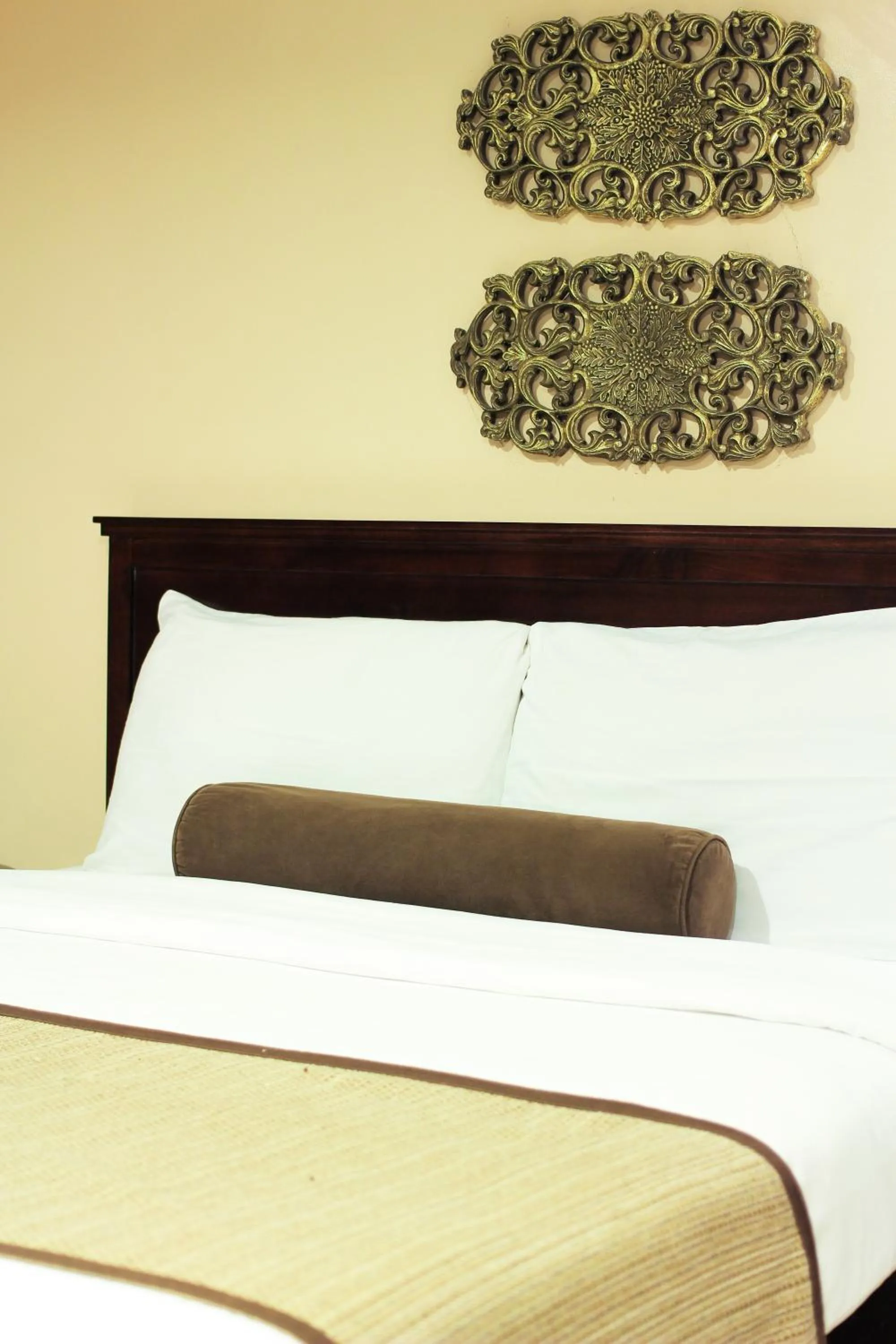 Bed in Crosswinds Resort Suites