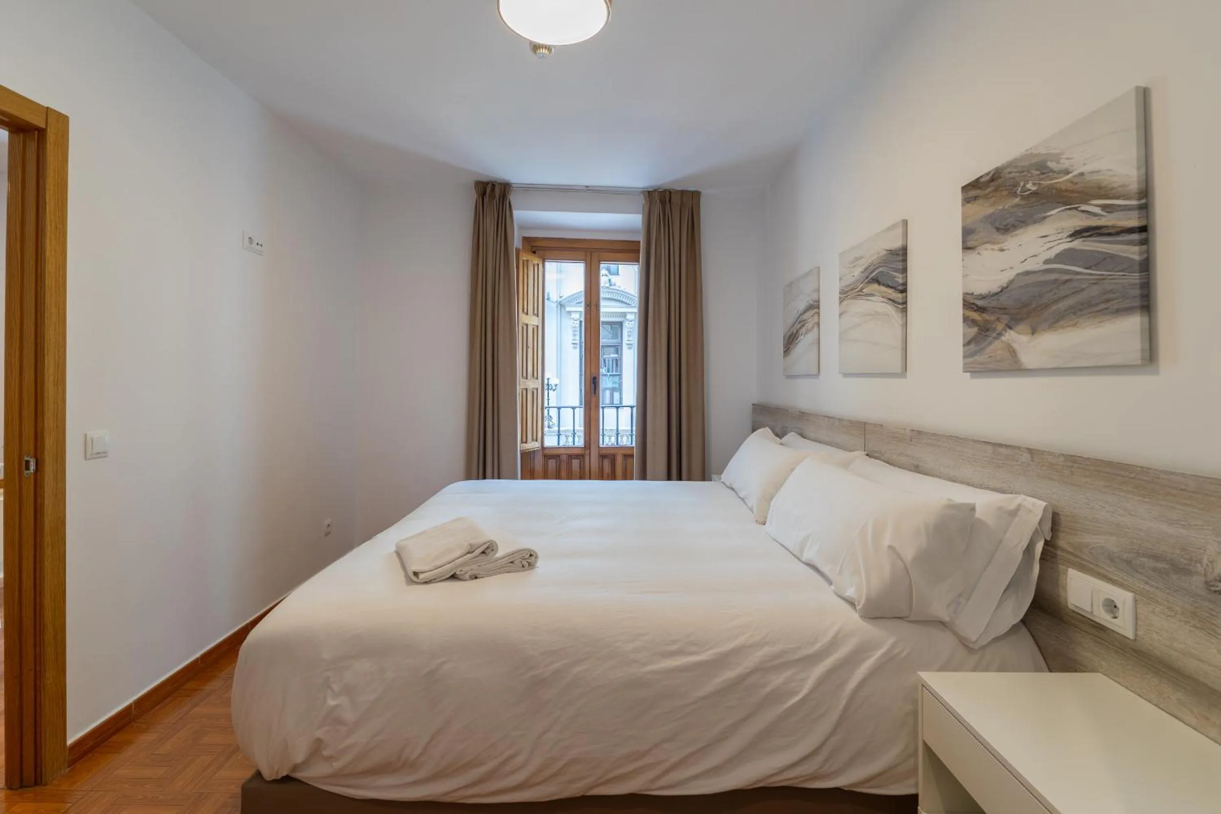 Bed in Apartamentos Madrid