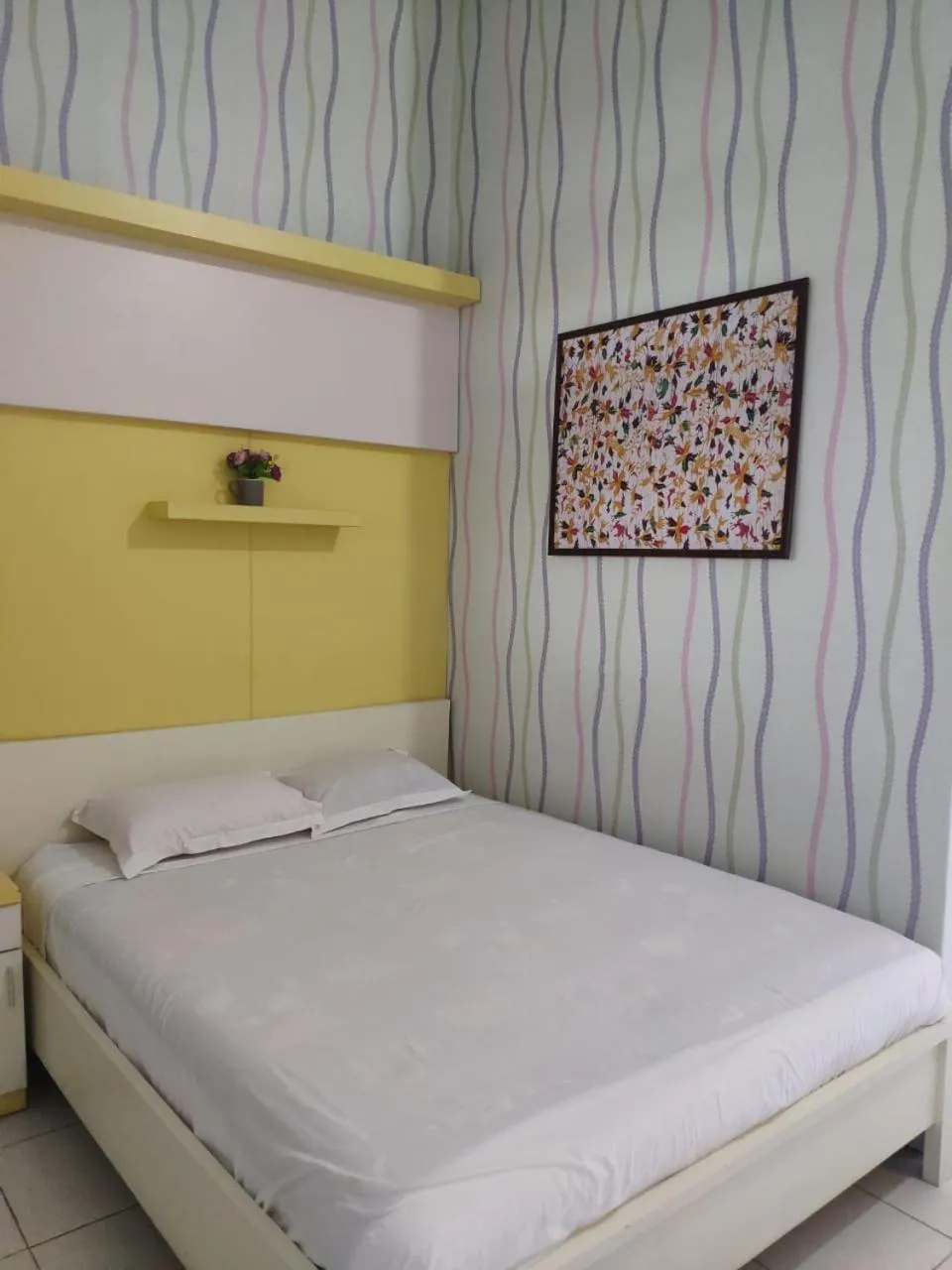 Bed in Hotel Boegenviel Syariah