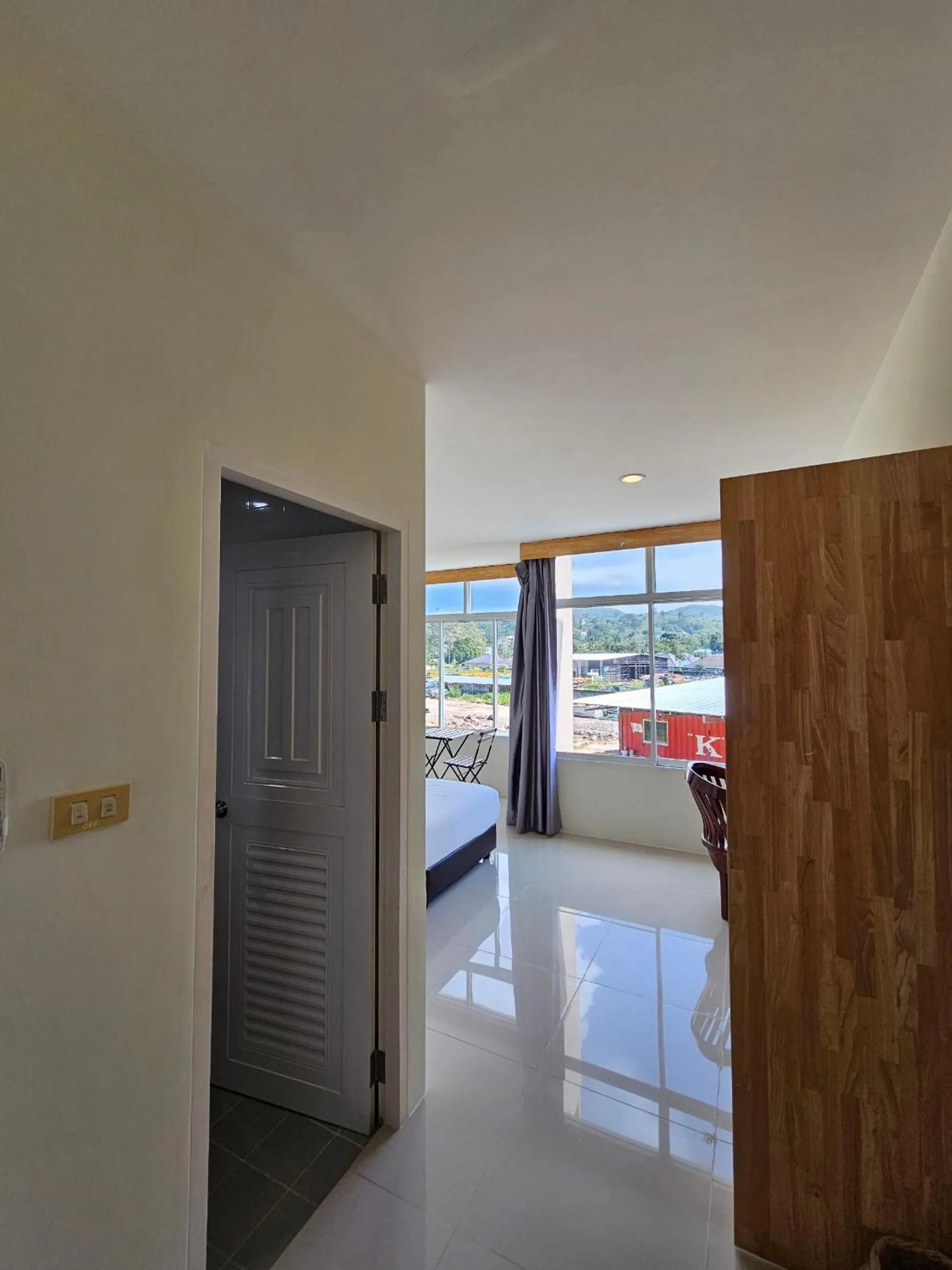 Bedroom in Dwell Phuket Airport Hotel at Naiyang