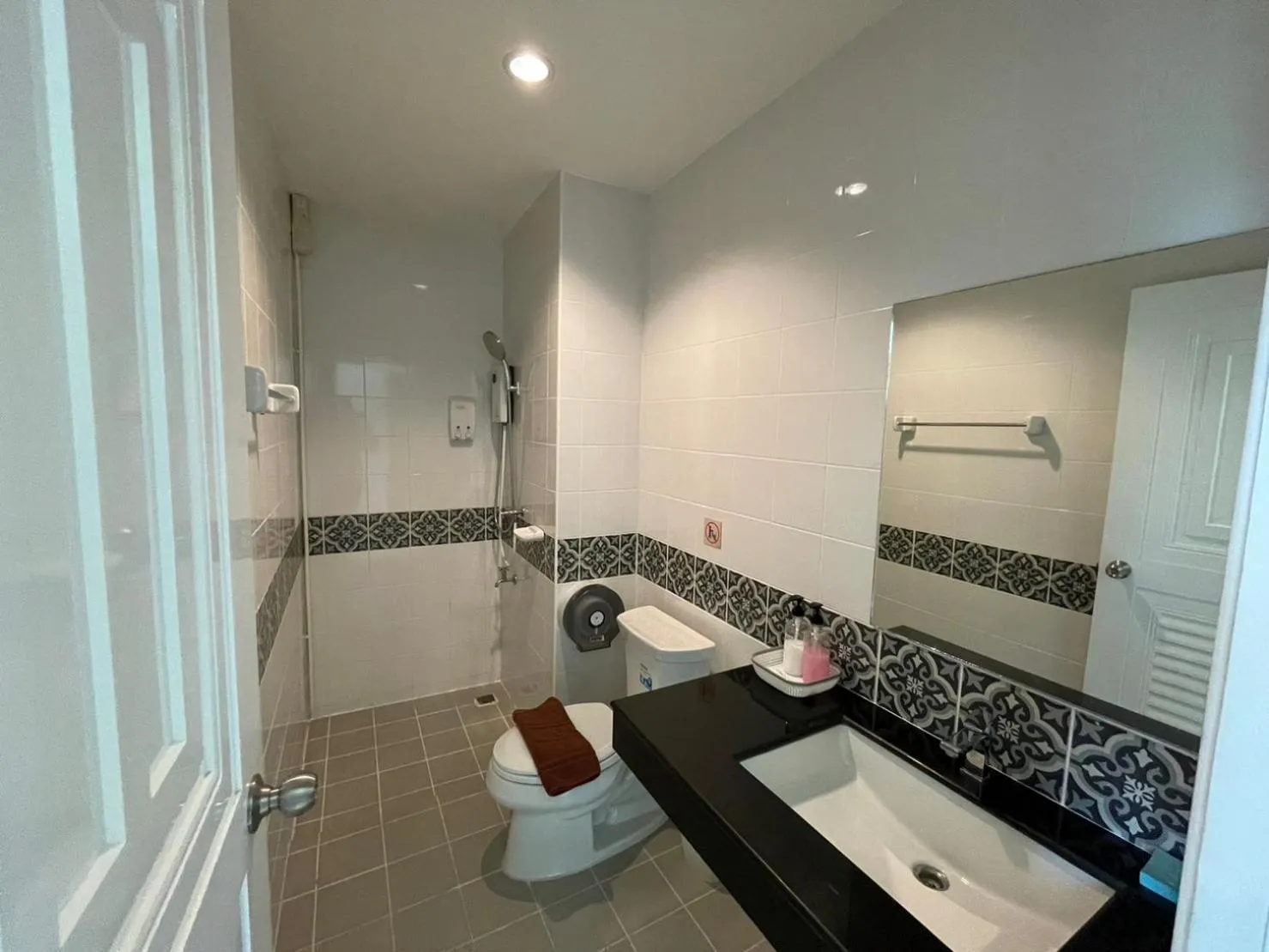 Bathroom in Dwell Phuket Airport Hotel at Naiyang