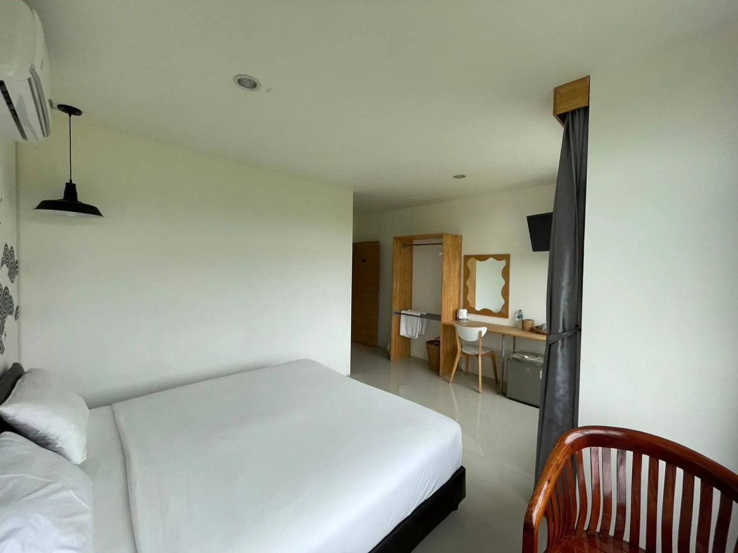 Bed in Dwell Phuket Airport Hotel at Naiyang