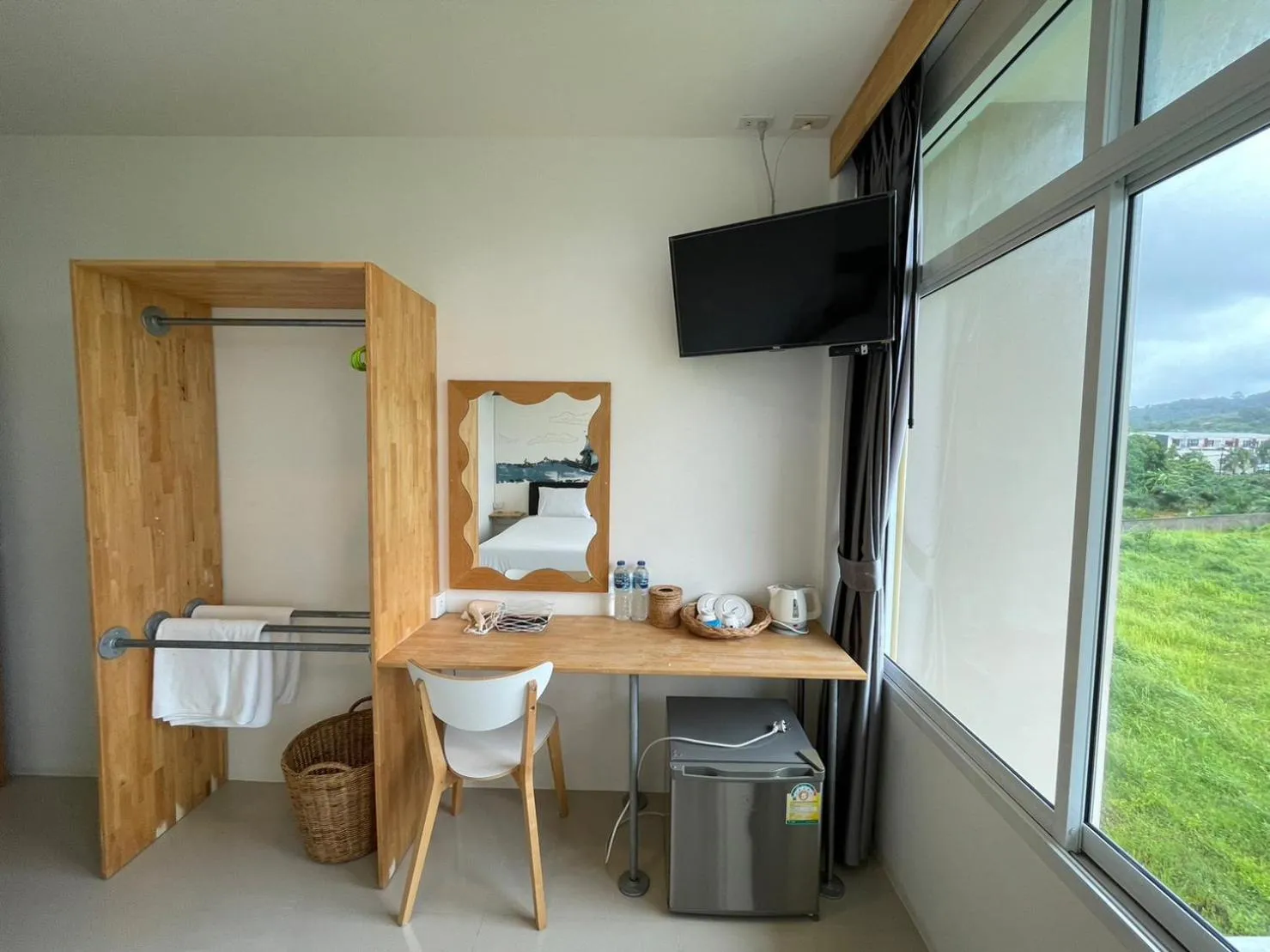 wardrobe in Dwell Phuket Airport Hotel at Naiyang