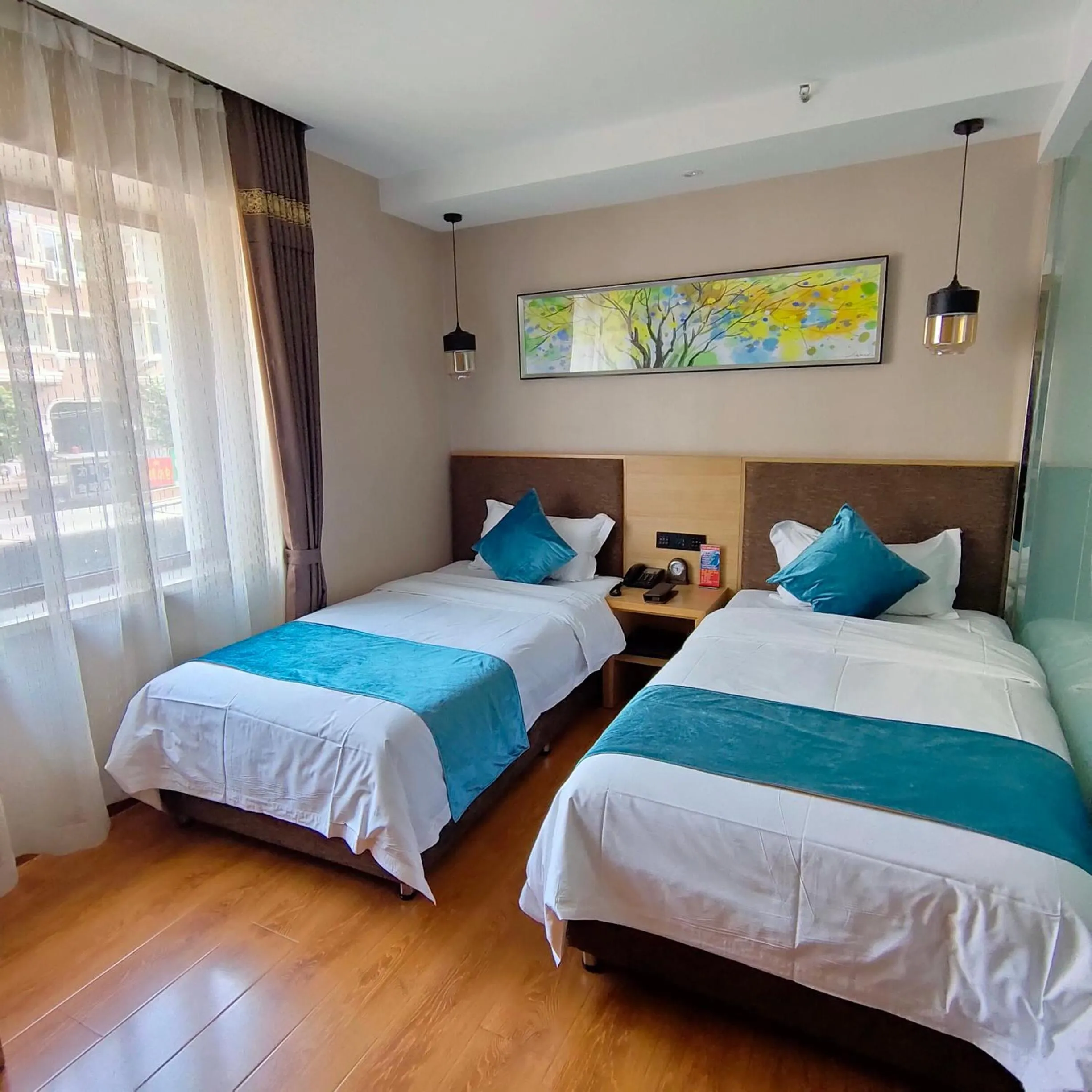 Photo of the whole room in Harbin Joy Boutique Hotel