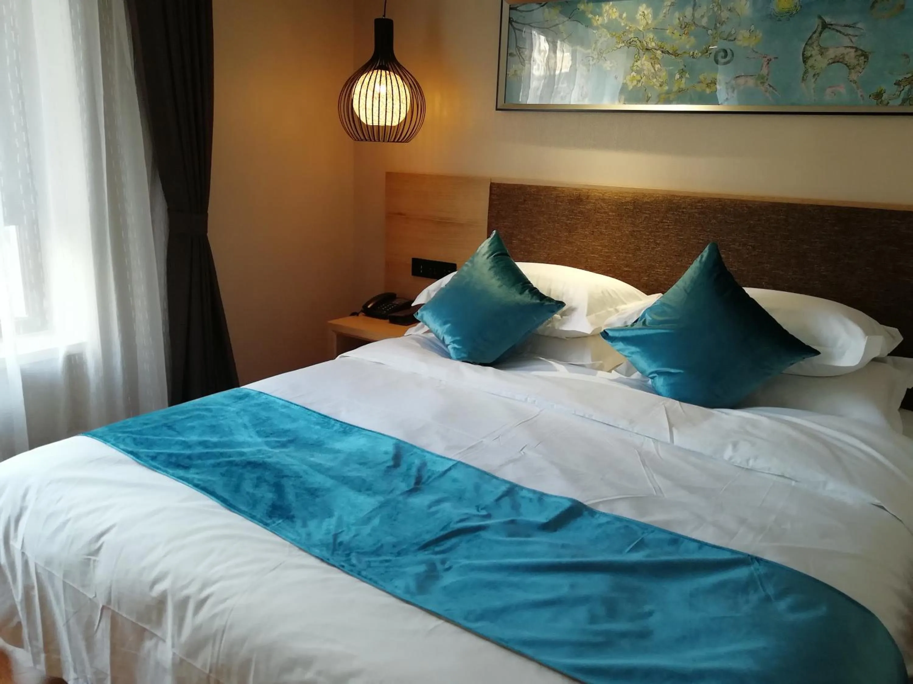 Bedroom in Harbin Joy Boutique Hotel