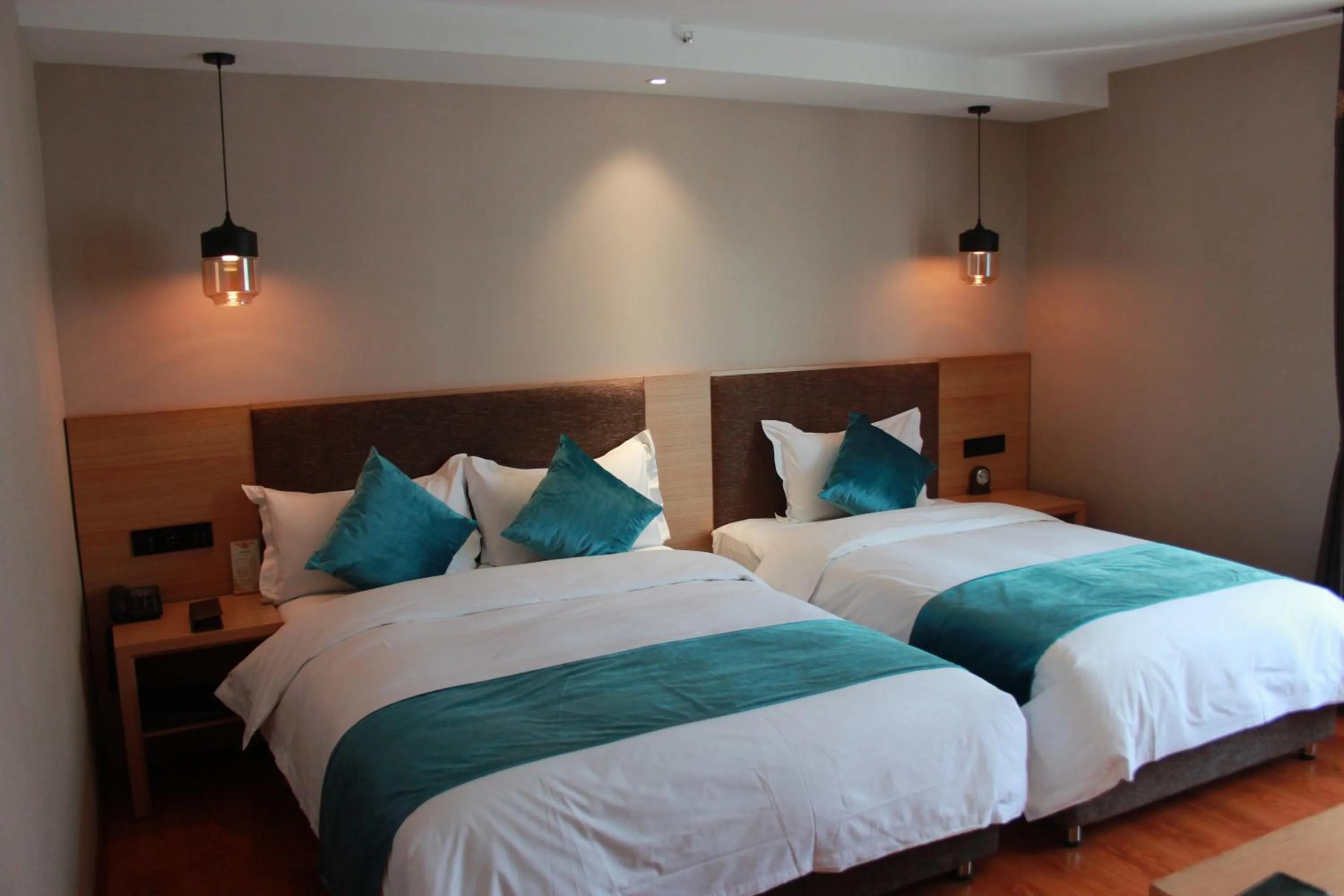 Bed in Harbin Joy Boutique Hotel