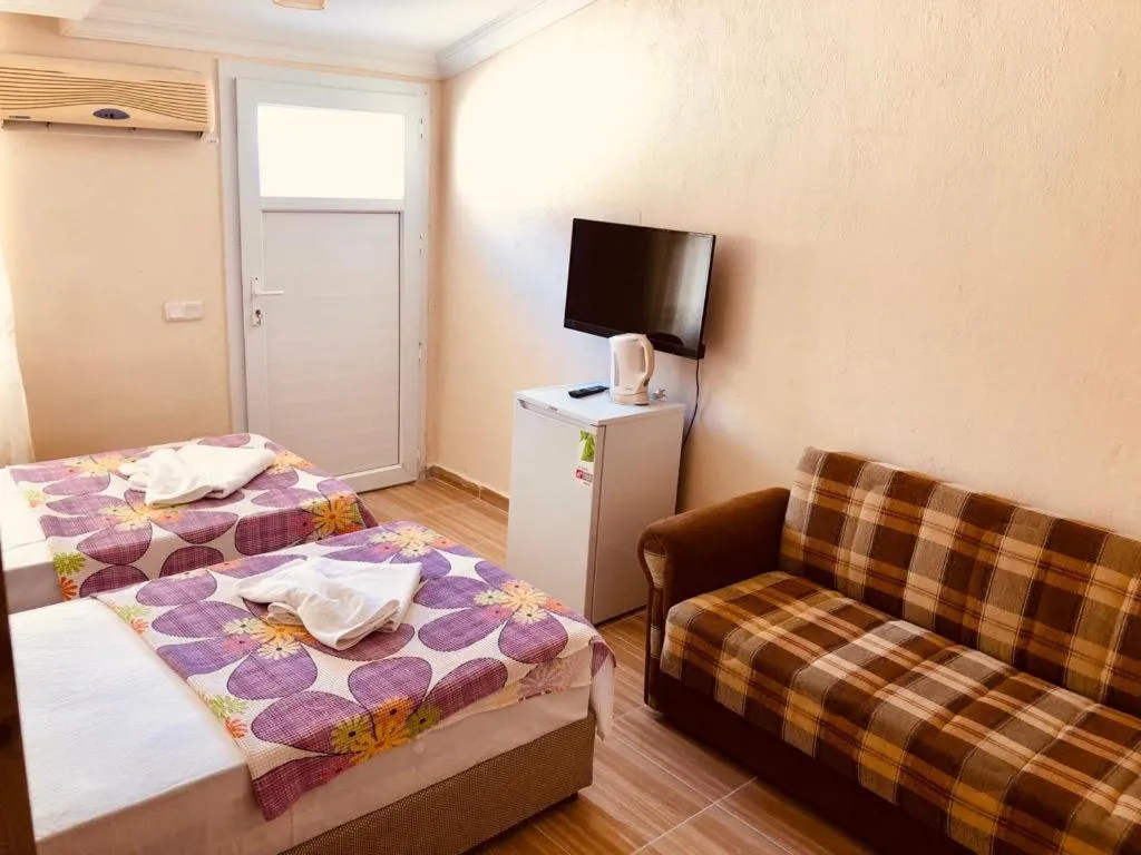 Photo of the whole room, Bed in Karaca Apart Hotel