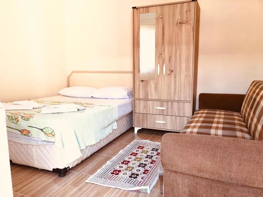 Bed in Karaca Apart Hotel