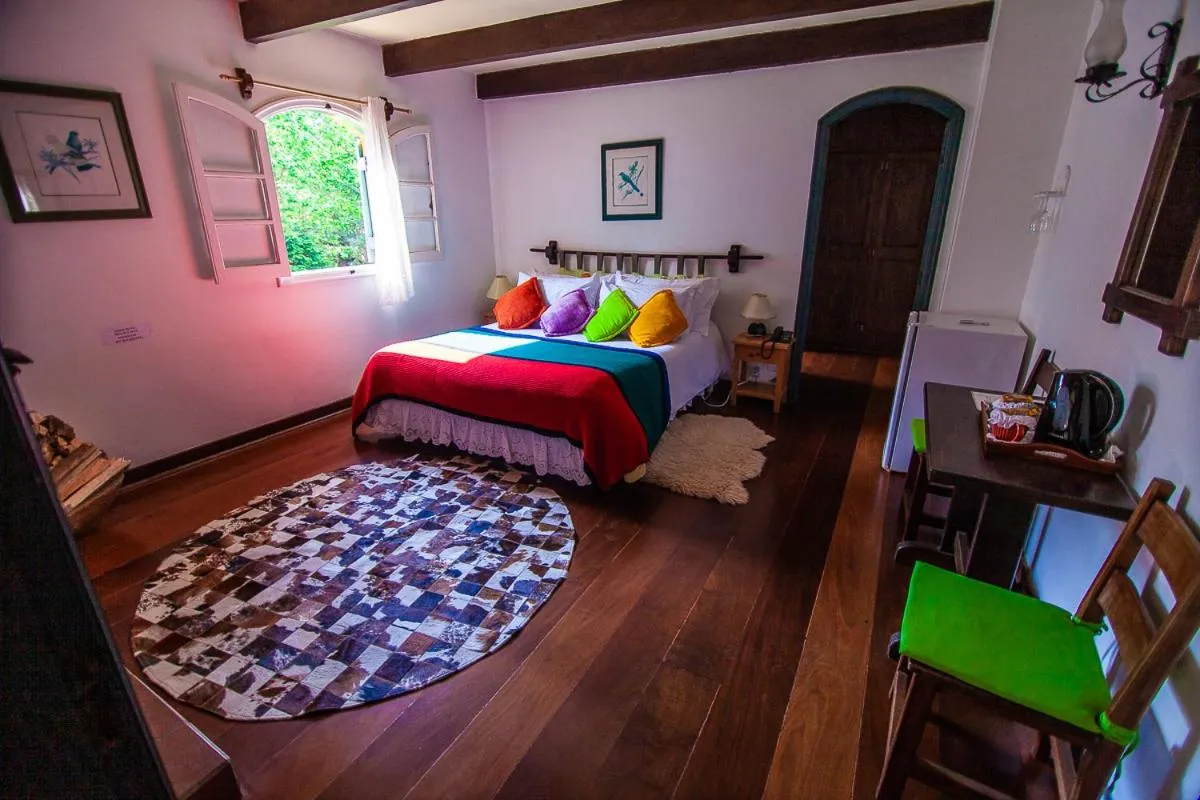 Photo of the whole room, Bed in Pousada Villa D'Amore