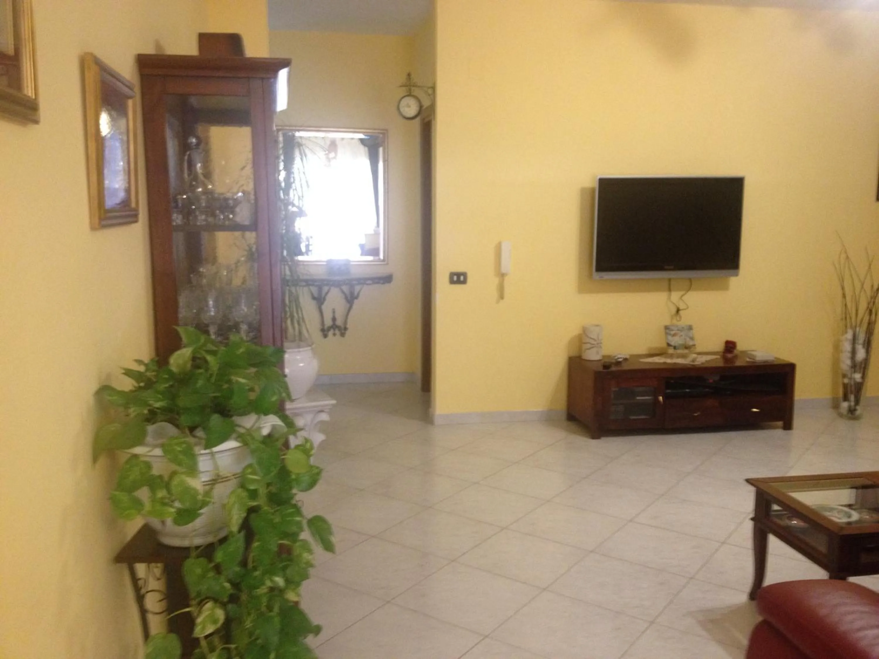 Communal lounge/ TV room in B&B Serenità