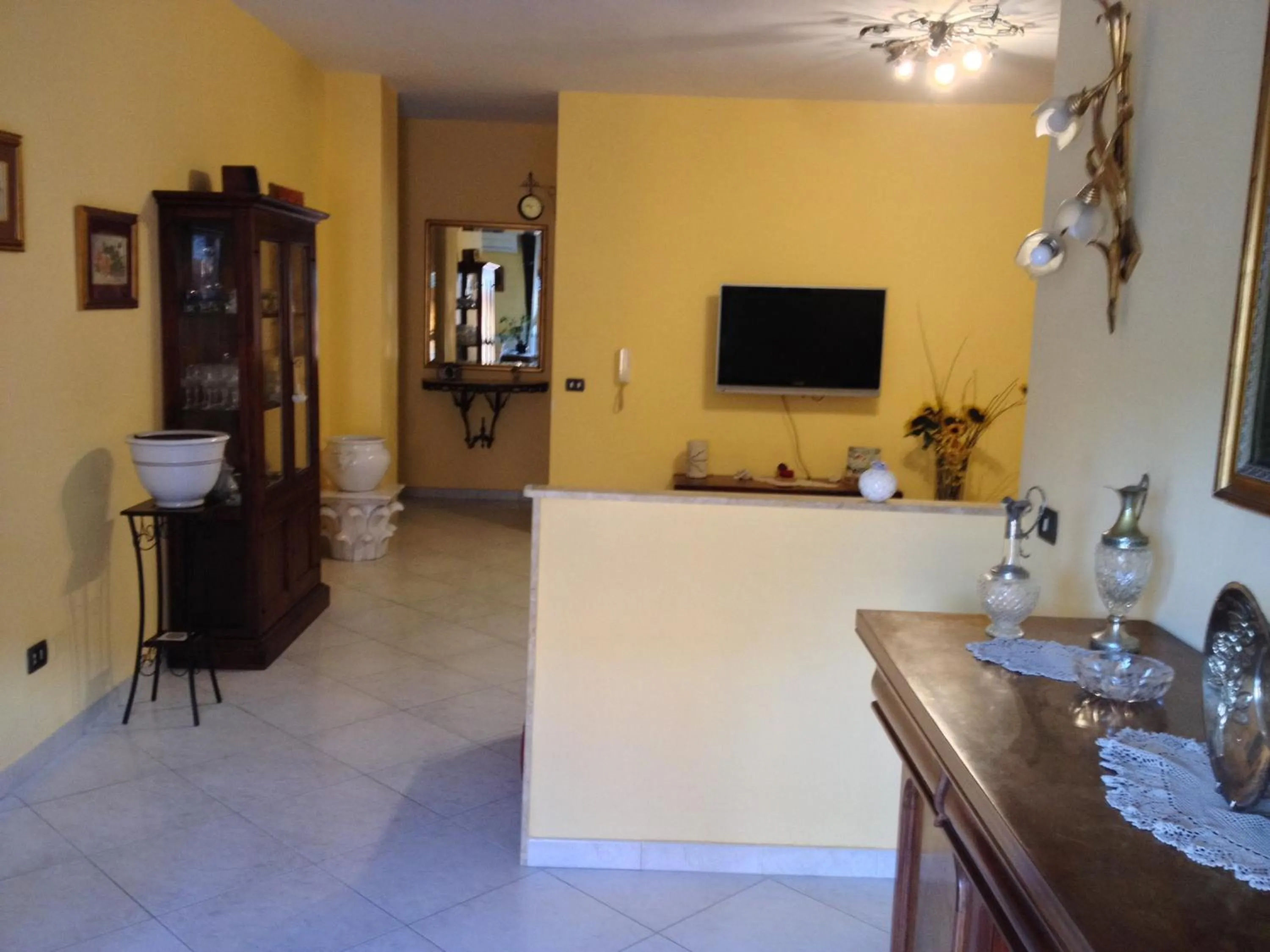 Communal lounge/ TV room in B&B Serenità