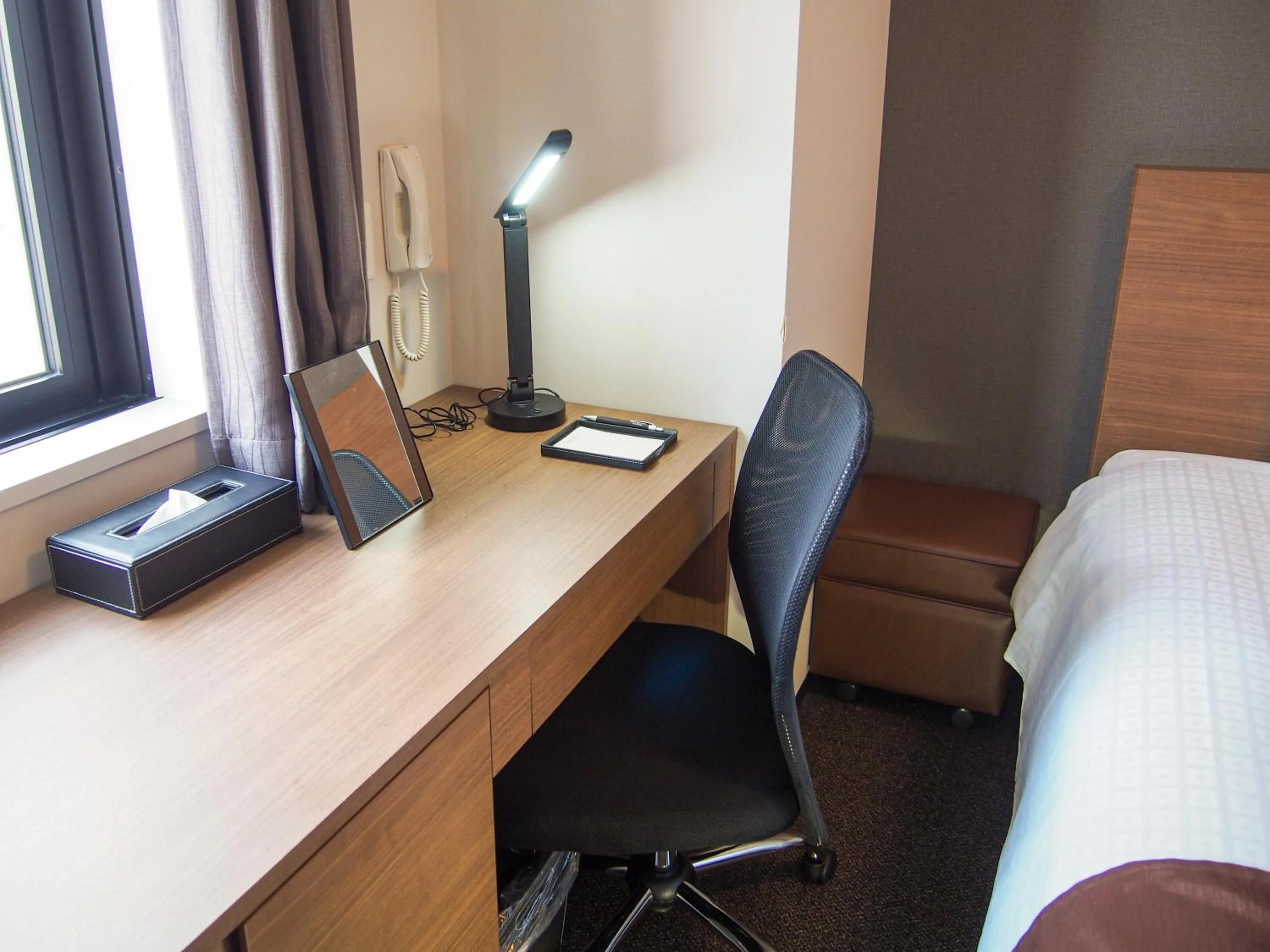 Bed in Smile Hotel Premium Sapporo Susukino