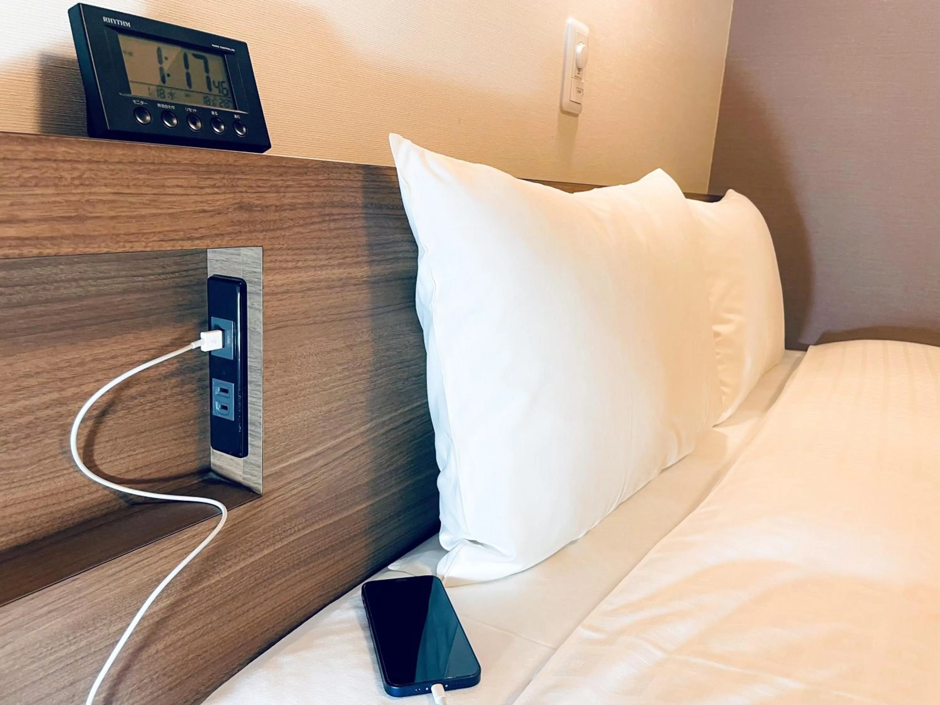 Bed in Smile Hotel Premium Sapporo Susukino