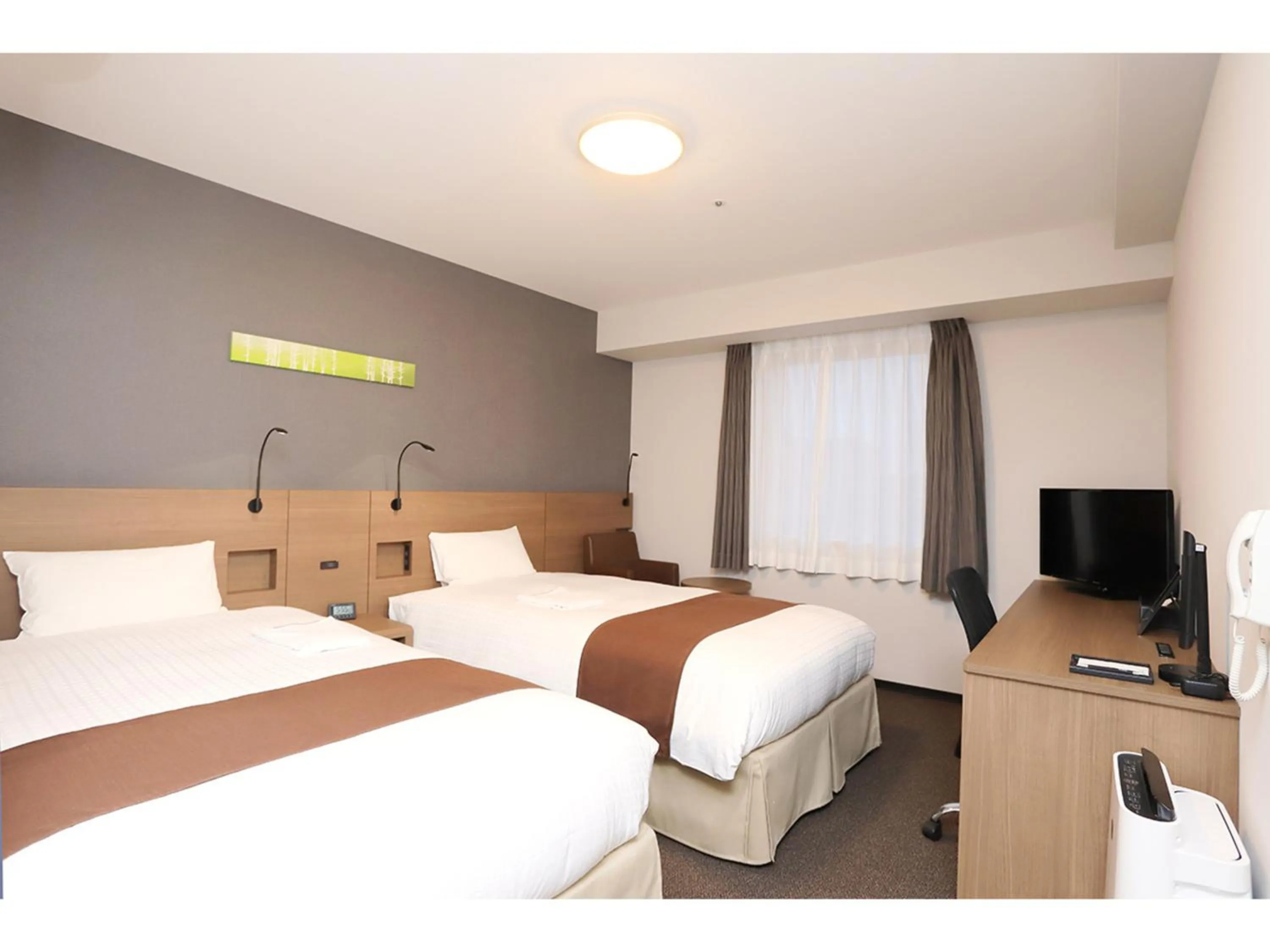 Bed in Smile Hotel Premium Sapporo Susukino