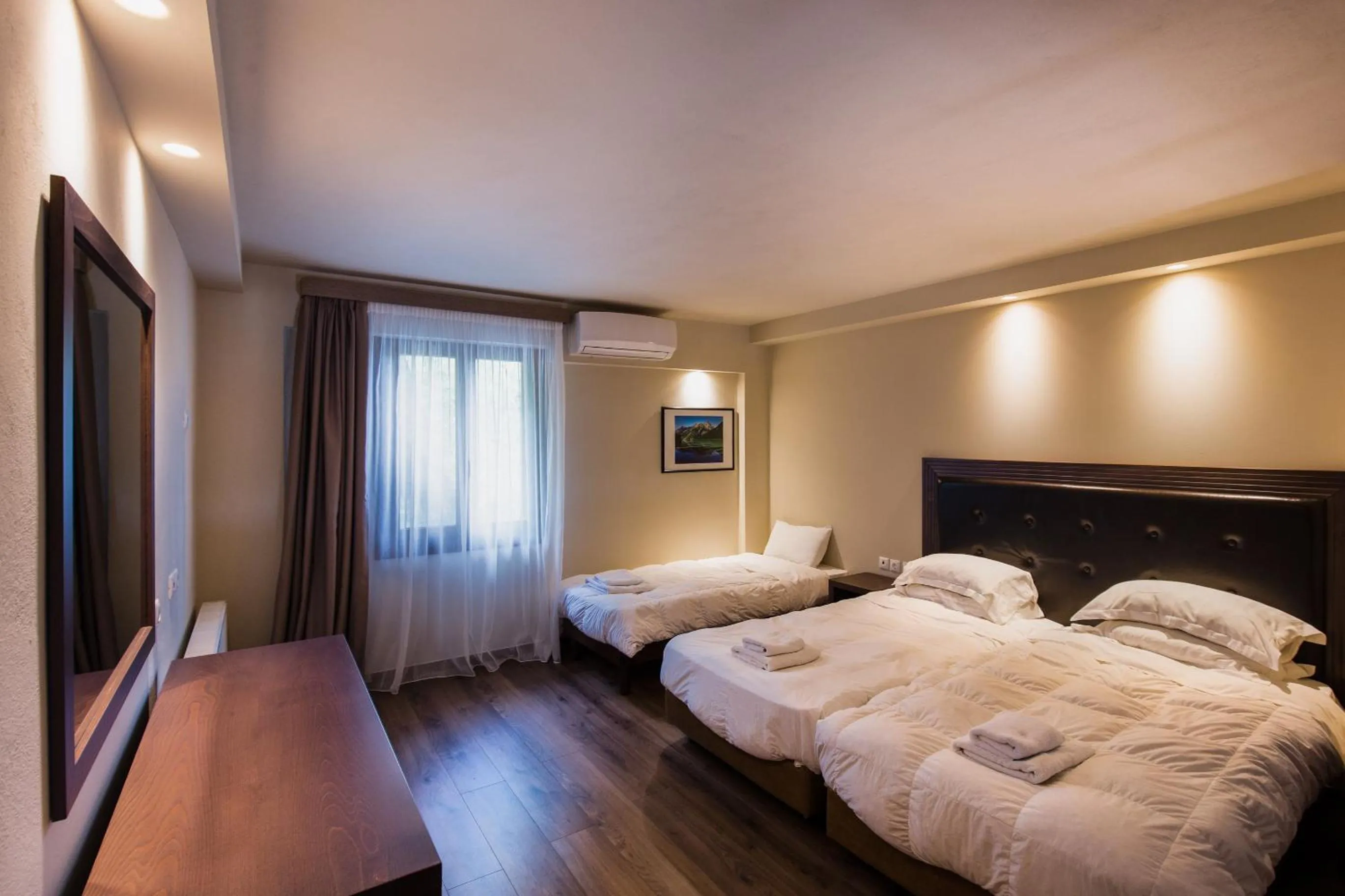Photo of the whole room, Bed in Nevros Hotel Resort and Spa Limni Plastira