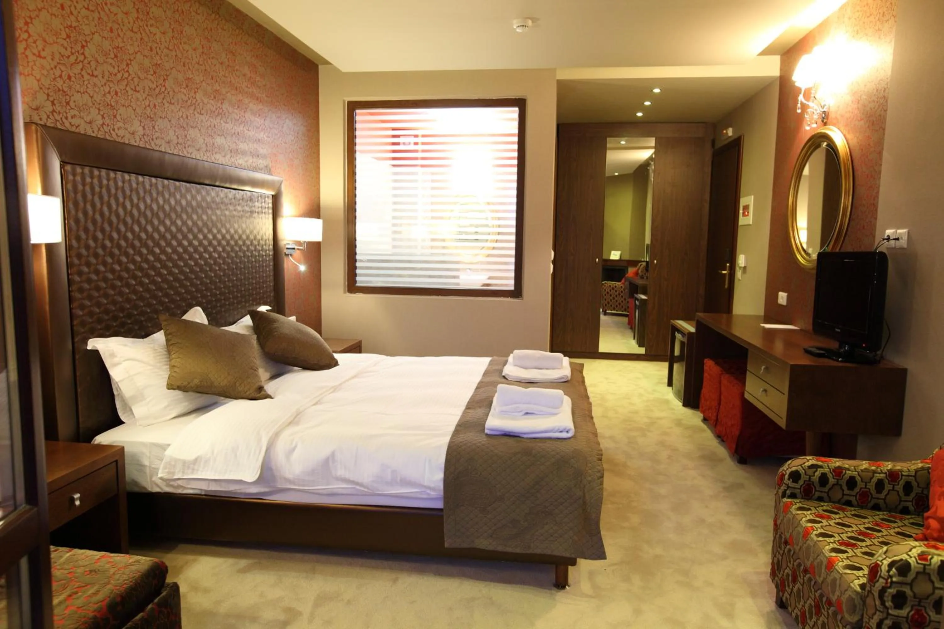 Photo of the whole room, Bed in Nevros Hotel Resort and Spa Limni Plastira