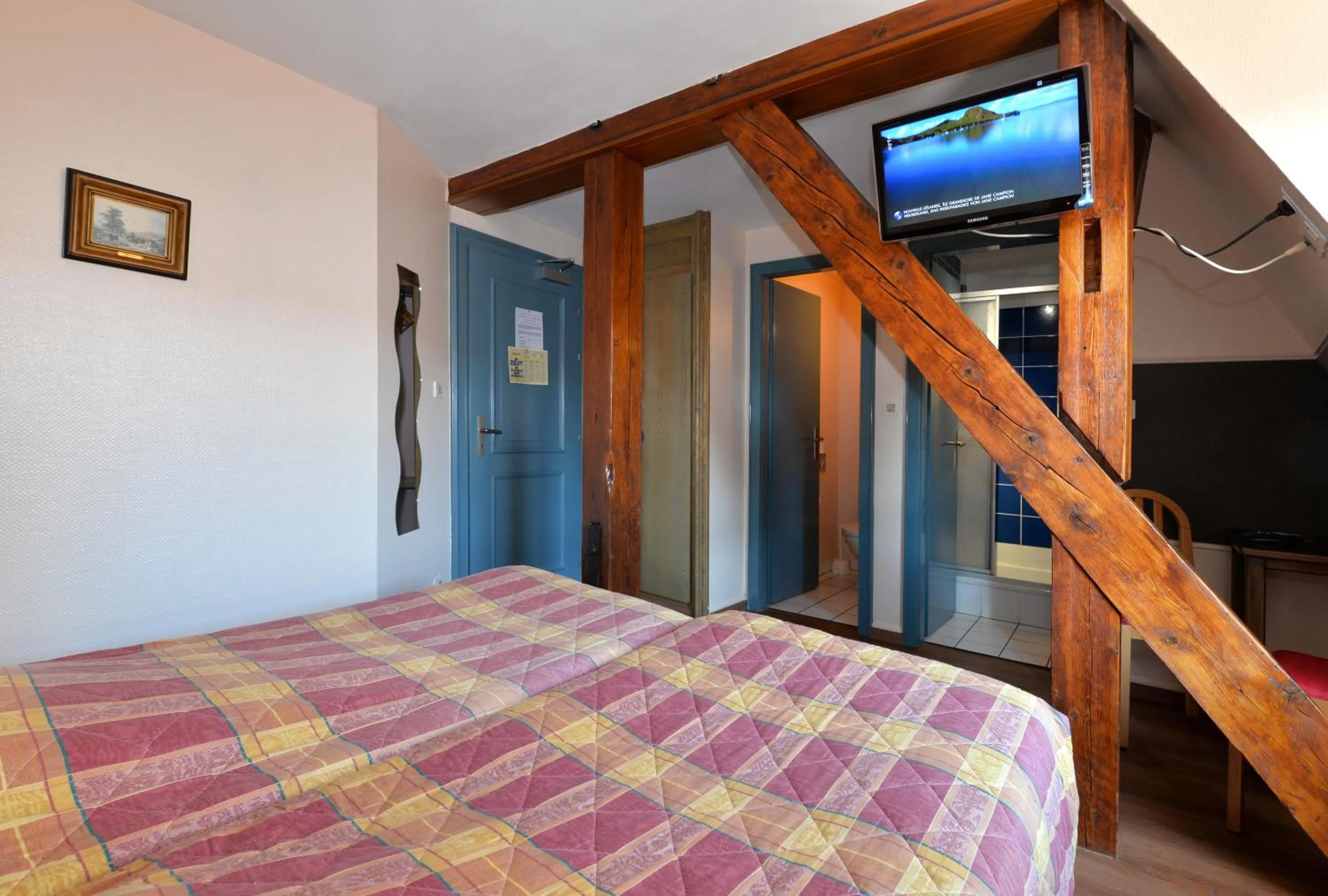 Bed in Hotel Restaurant Dontenville